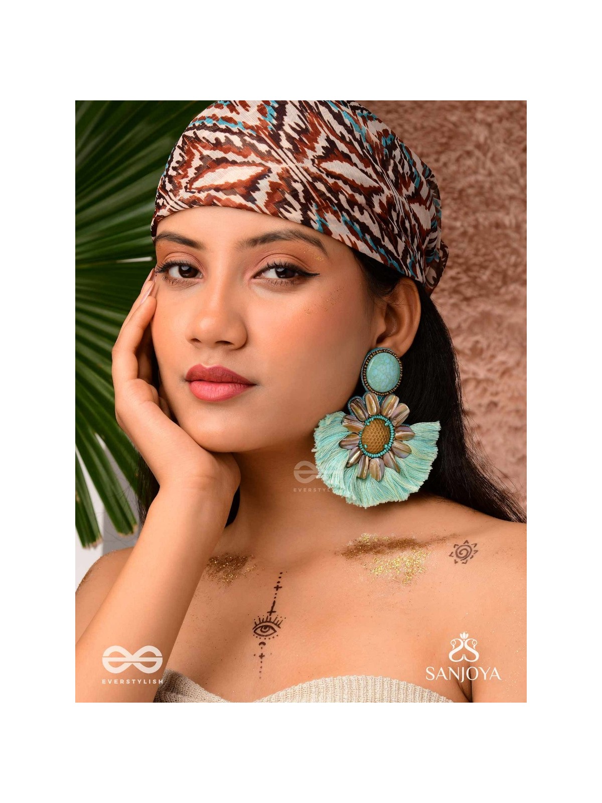 Vibhusitpuspa - the adorned flower - embroidered flower earrings with turquoise tassles