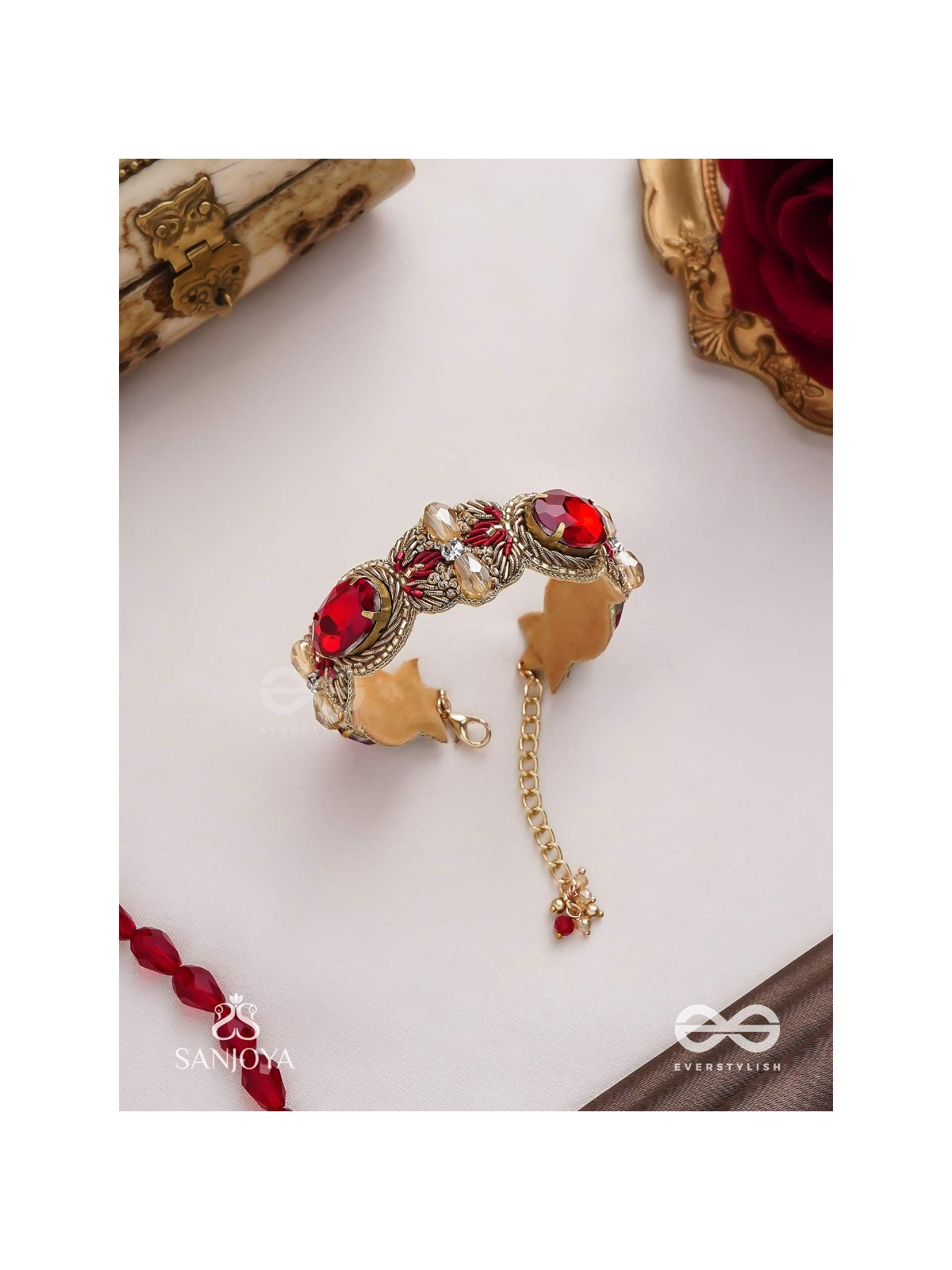 Sundarasūra- Beautiful Wine- Bracelet with rich hue of the red stones and twisted thread work.