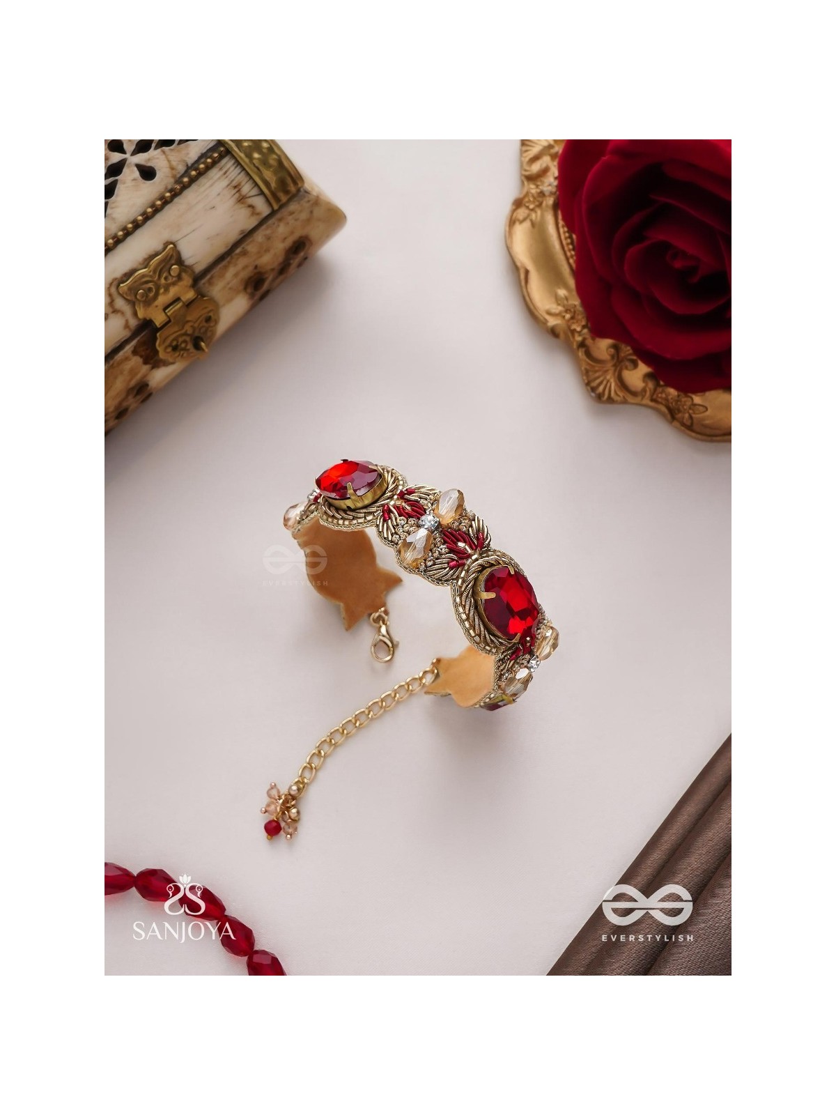 Sundarasūra- Beautiful Wine- Bracelet with rich hue of the red stones and twisted thread work.