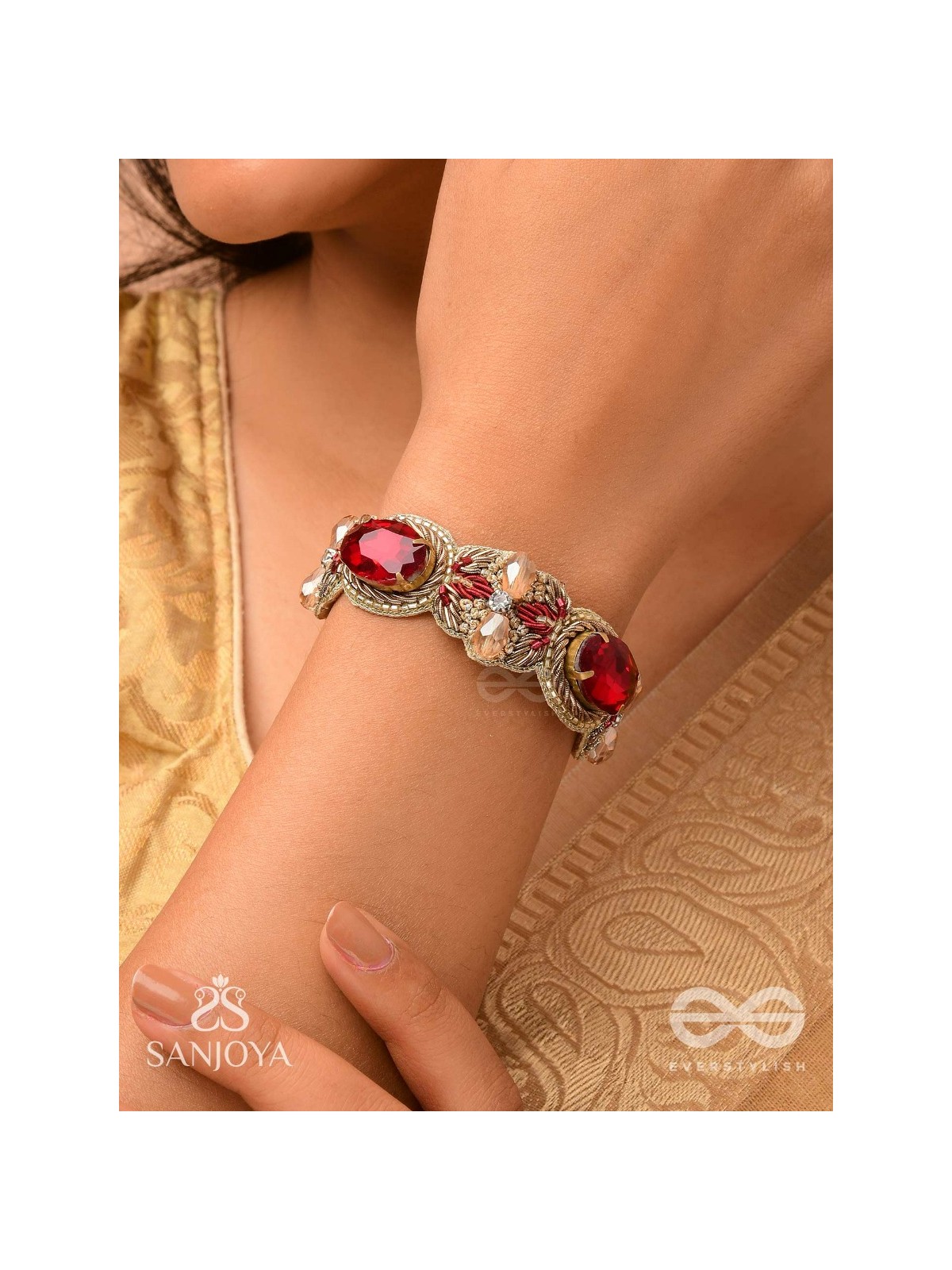 Sundarasūra- Beautiful Wine- Bracelet with rich hue of the red stones and twisted thread work.