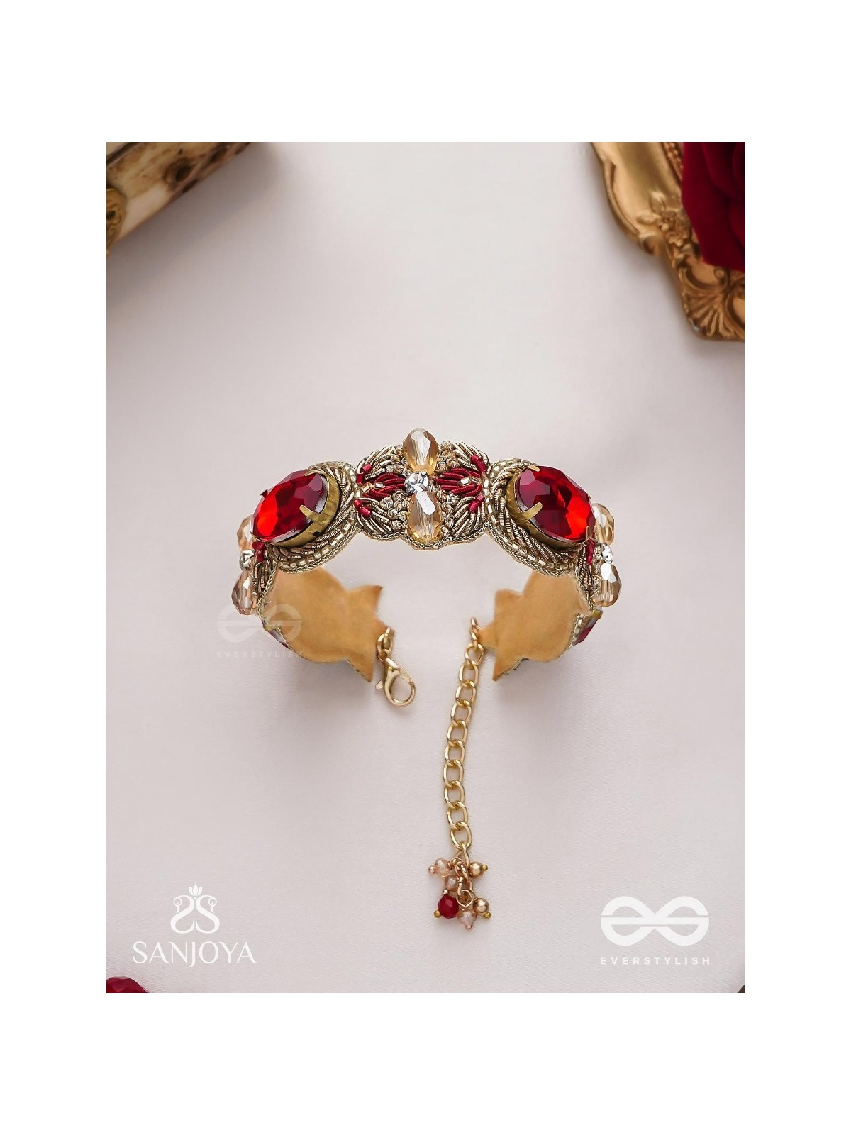 Sundarasūra- Beautiful Wine- Bracelet with rich hue of the red stones and twisted thread work.