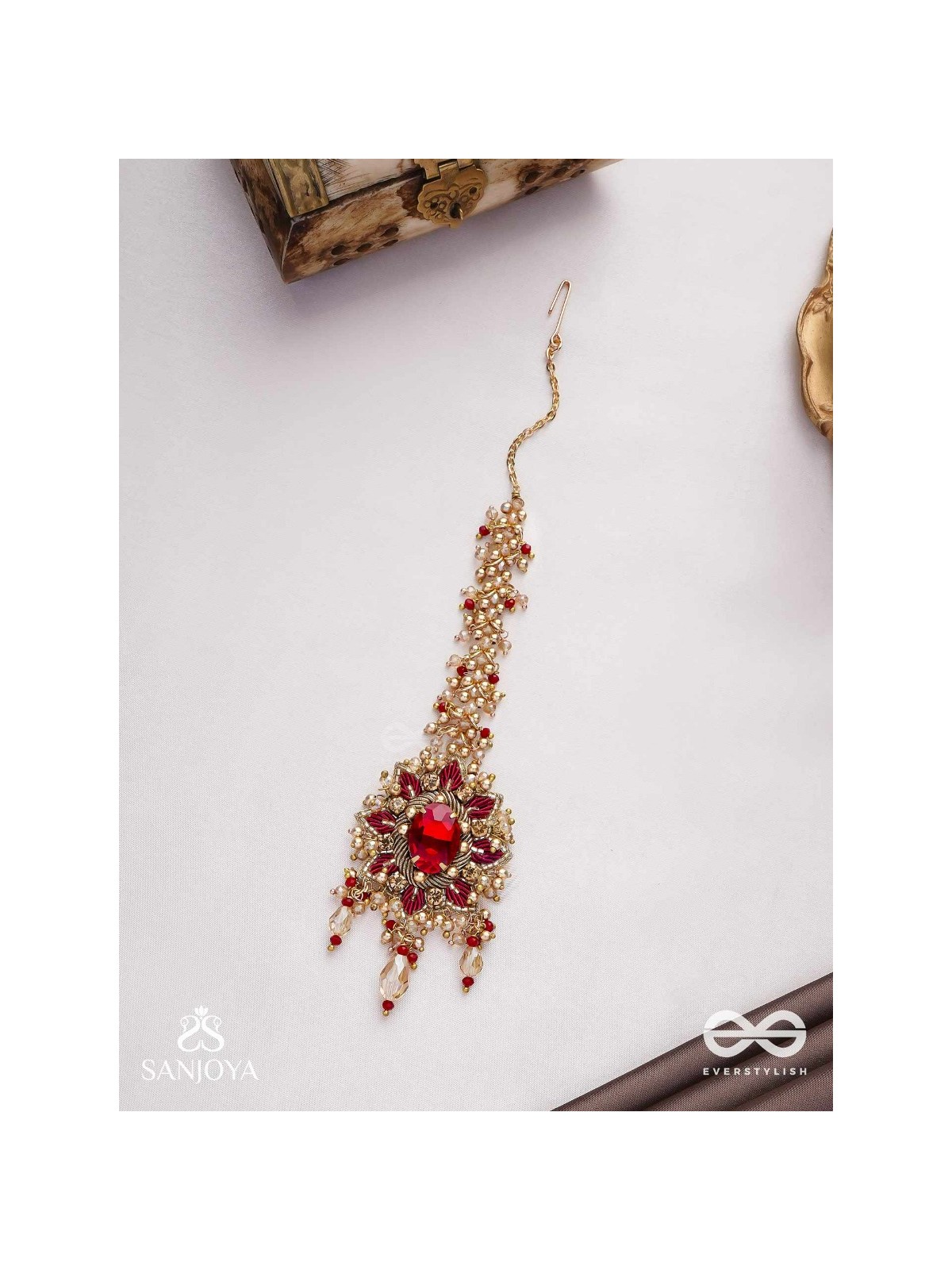 Kumudinikunda-Delicate lotus-Embroidered hair accessory with a red stone & golden embellishments