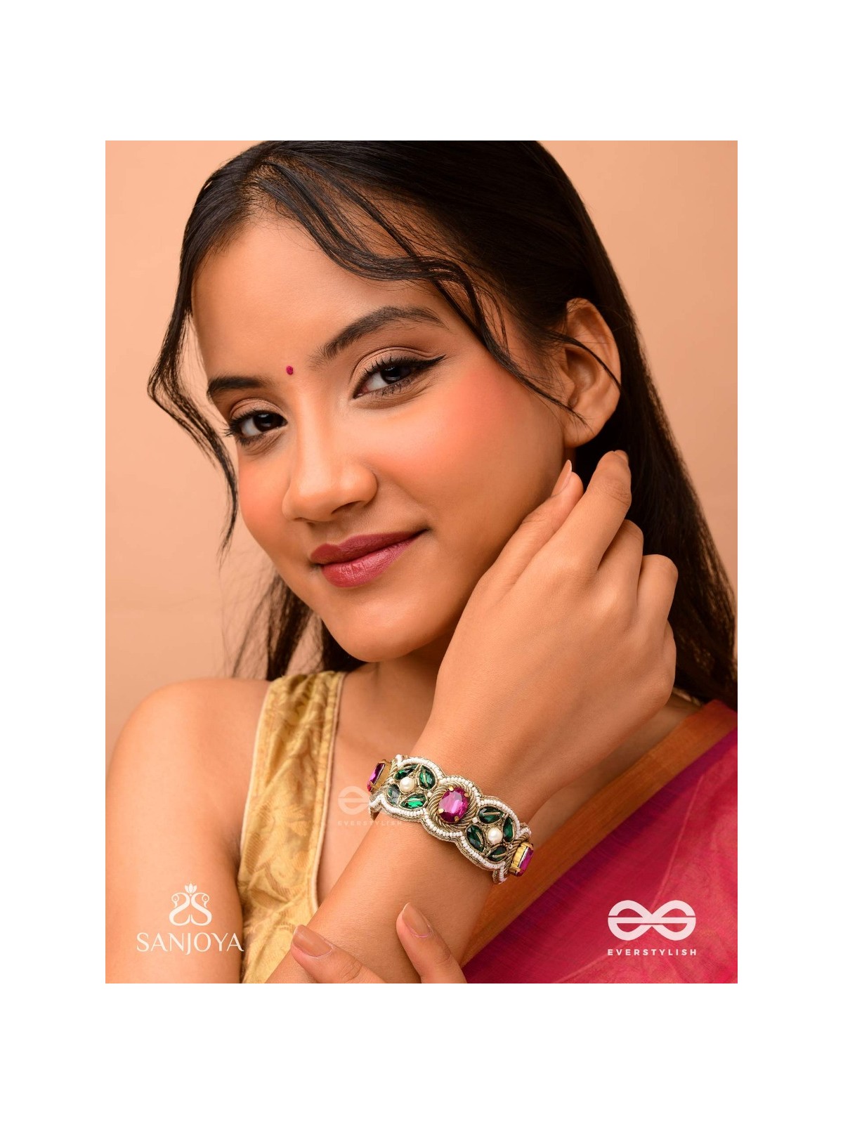 Tarangini-Wavy beauty-opulent bracelet embedded with purple and green stones