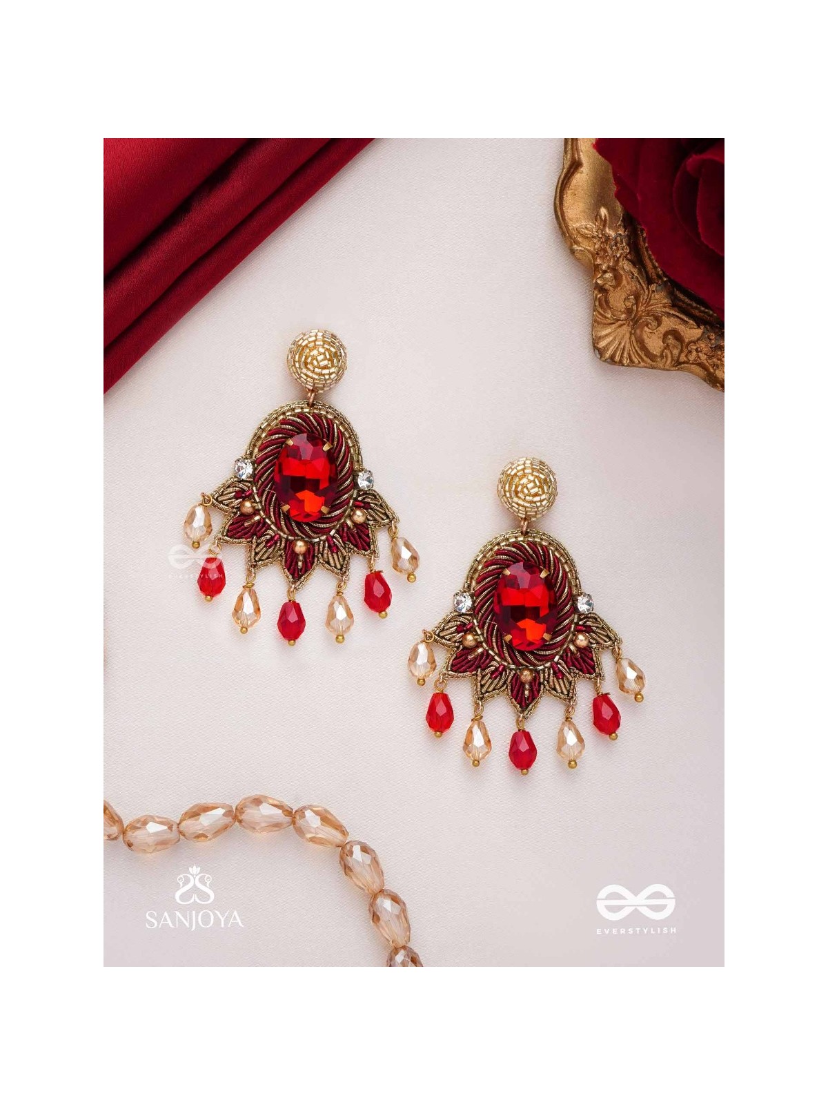 RAKTAVARNA-RED HUE HAND-EMBROIDERED EARRINGS IN RED AND GOLD TONES, FEATURING STONES, GLASS BEADS, AND INTRICATE RESHAM THREAD WORK