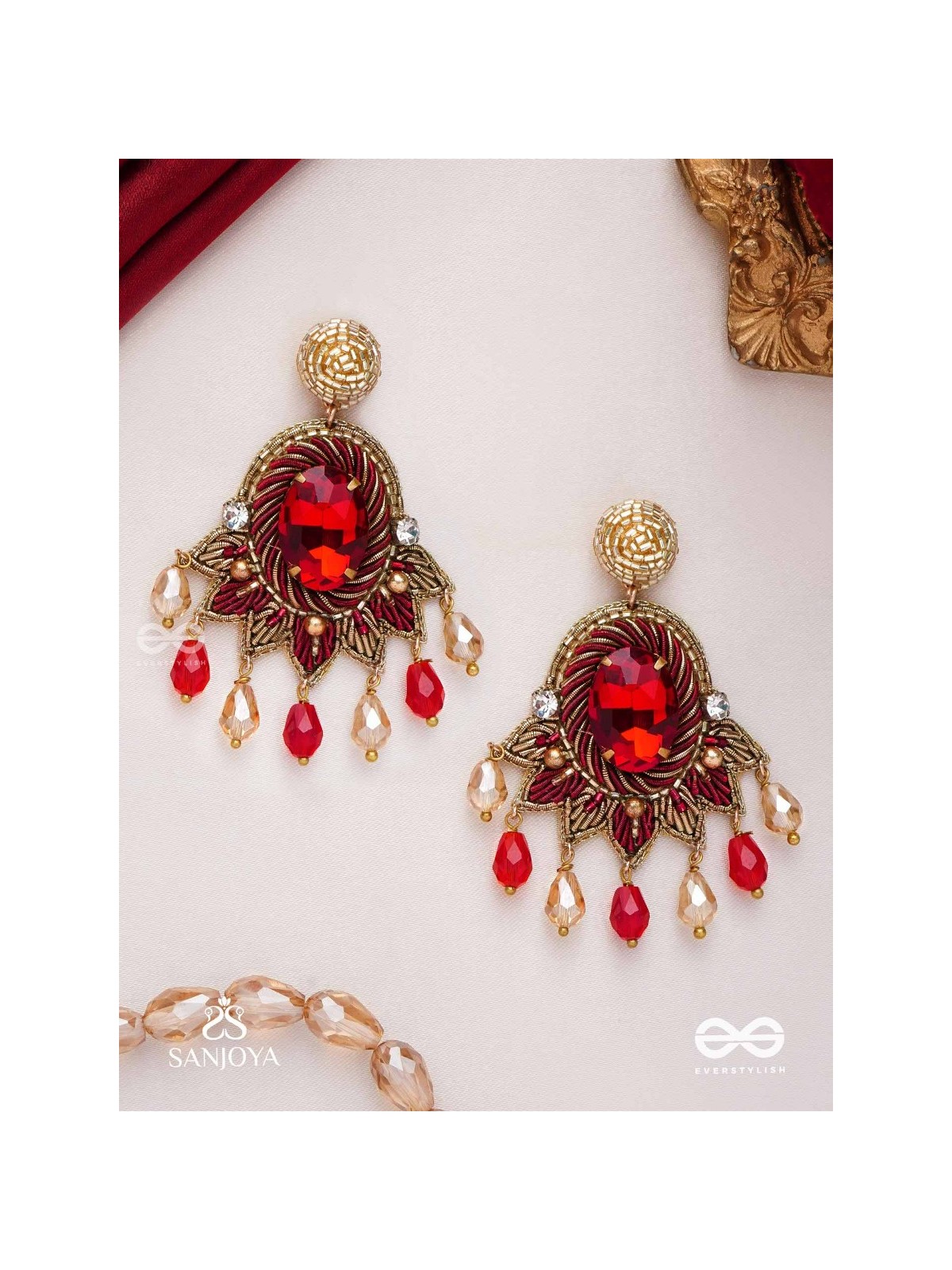 RAKTAVARNA-RED HUE HAND-EMBROIDERED EARRINGS IN RED AND GOLD TONES, FEATURING STONES, GLASS BEADS, AND INTRICATE RESHAM THREAD WORK