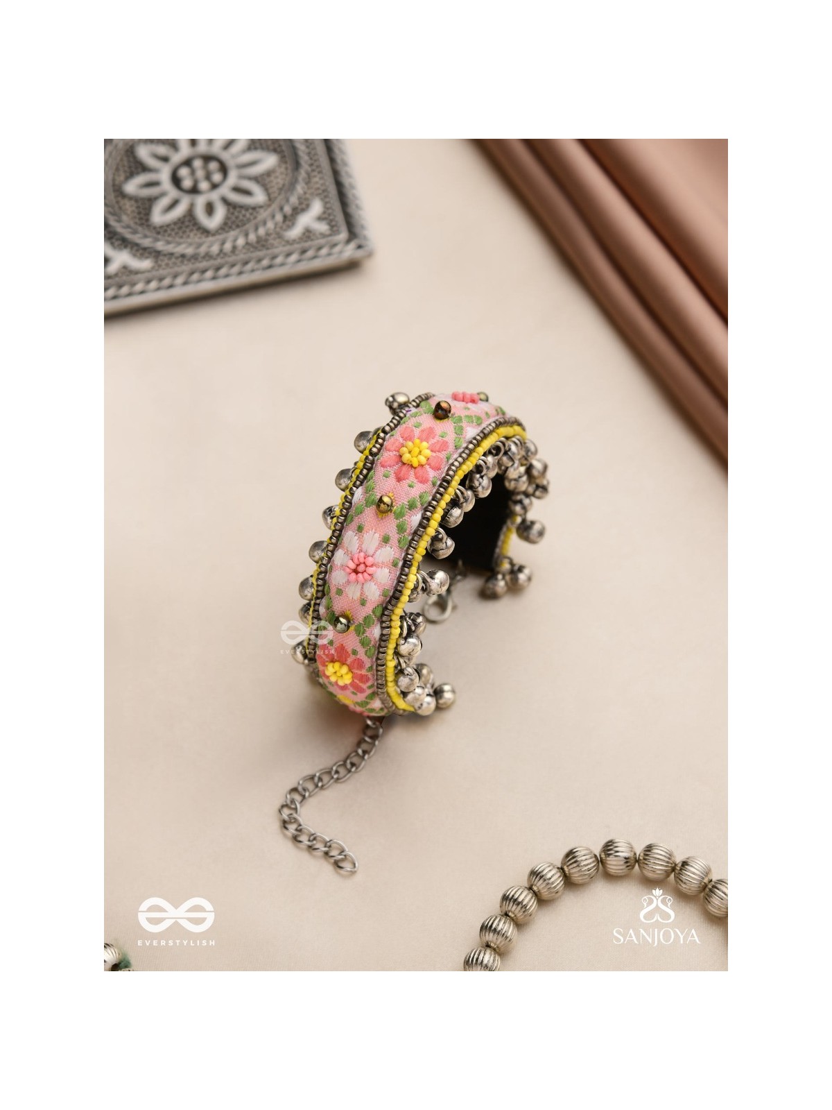 SUMANALEKHA-FLORAL PATTERN- SEMI-OXIDIZED BRACELET FEATURES GHUNGROO, BEADS, AND EMBROIDERED FLOWERS
