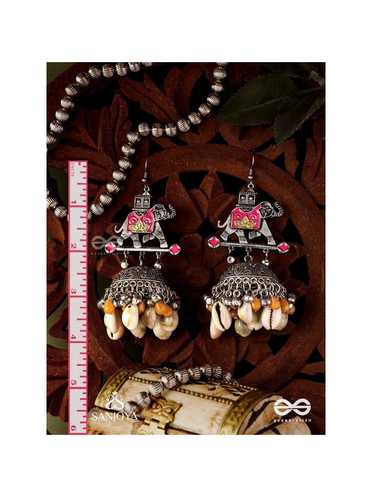 GAJASANKHA KARṆIKA- ELEPHANT-SHELL EARRINGS- OXIDIZED EARRINGS FEATURING AN ELEGANT MOTIF, DELICATE GHUNGHROO'S, AND COWRIE SHELLS