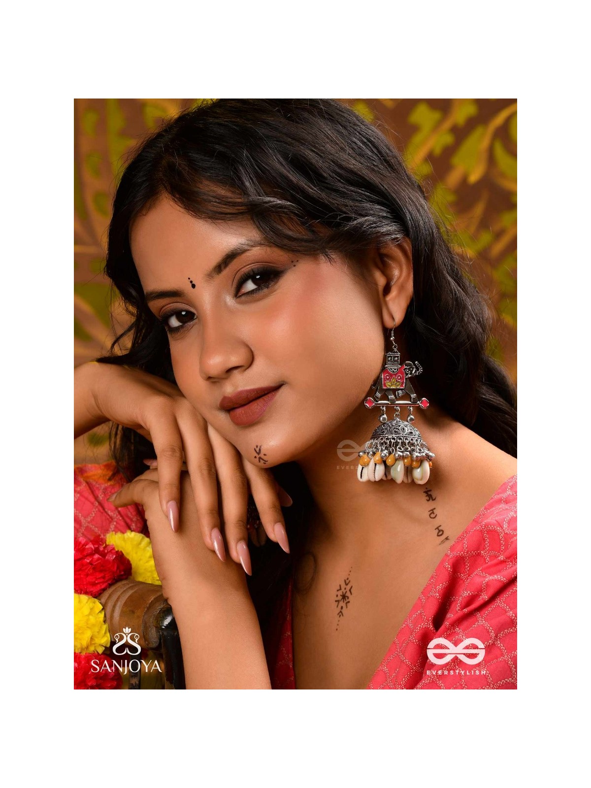 GAJASANKHA KARṆIKA- ELEPHANT-SHELL EARRINGS- OXIDIZED EARRINGS FEATURING AN ELEGANT MOTIF, DELICATE GHUNGHROO'S, AND COWRIE SHELLS