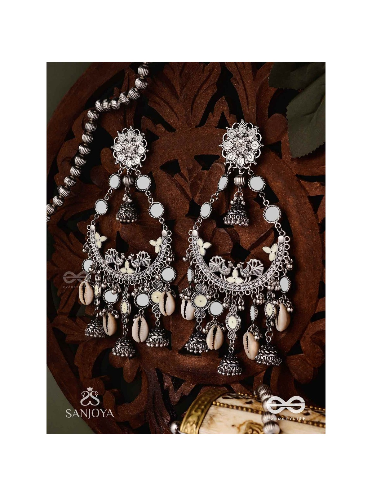 CHANDRAMAYURA- MOON-PEACOCK EARRINGS- OXIDIZED CHAANDBAALI EARRINGS, ADORNED WITH MIRRORS, GHUNGHROOS, COWRIE SHELLS, AND DANGLING JHUMKA