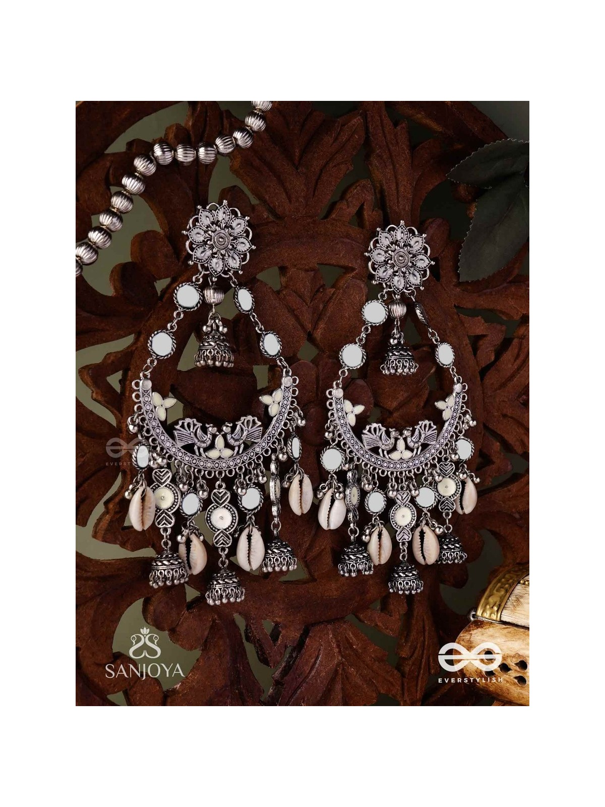 CHANDRAMAYURA- MOON-PEACOCK EARRINGS- OXIDIZED CHAANDBAALI EARRINGS, ADORNED WITH MIRRORS, GHUNGHROOS, COWRIE SHELLS, AND DANGLING JHUMKA