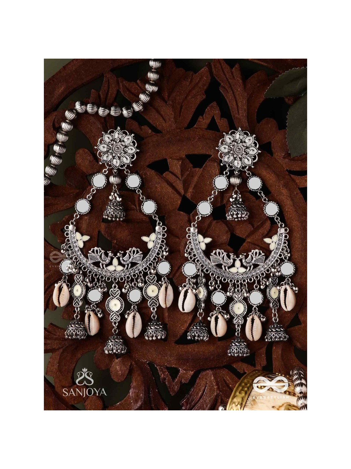 CHANDRAMAYURA- MOON-PEACOCK EARRINGS- OXIDIZED CHAANDBAALI EARRINGS, ADORNED WITH MIRRORS, GHUNGHROOS, COWRIE SHELLS, AND DANGLING JHUMKA