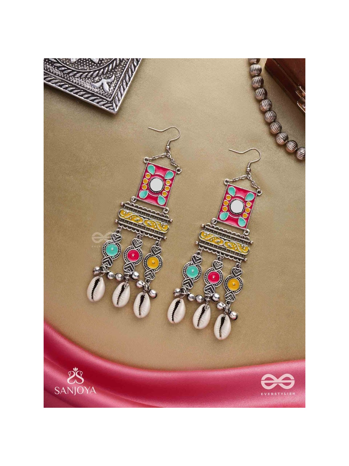 SINGHASANAMUKTA- THRONE GEM- OXIDIZED ENAMELLED EARRINGS IN MULTICOLOUR MOTIFS WITH GHUNGHROO'S AND COWRIE SHELLS