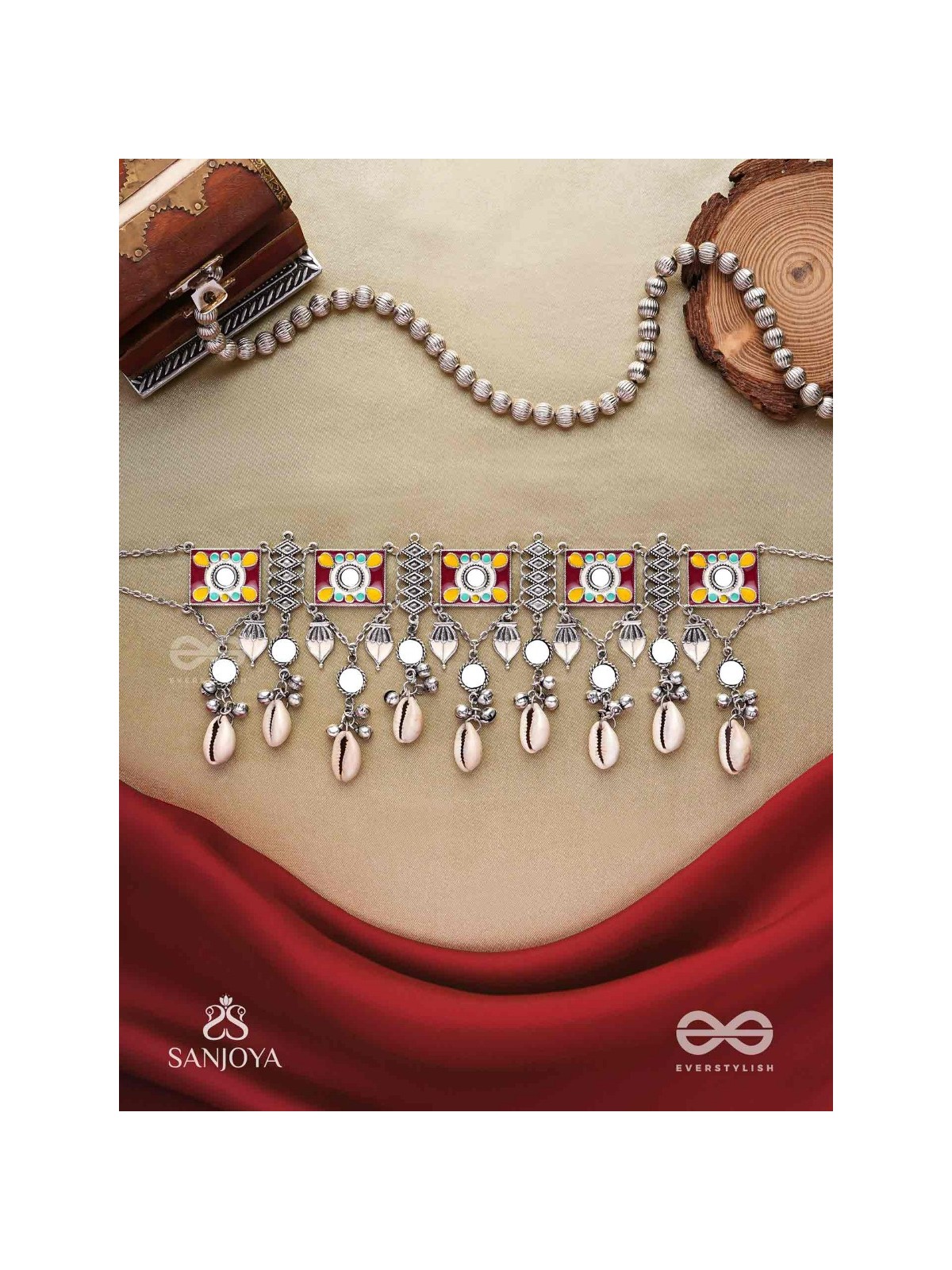 SANGRAHITAVARNA- COLLECTED HUES- ENAMELLED OXIDIZED CHOKER NECKPIECE IN PASTEL HUES WITH COWRIE SHELLS, GHUNGROOS AND MIRRORWORK
