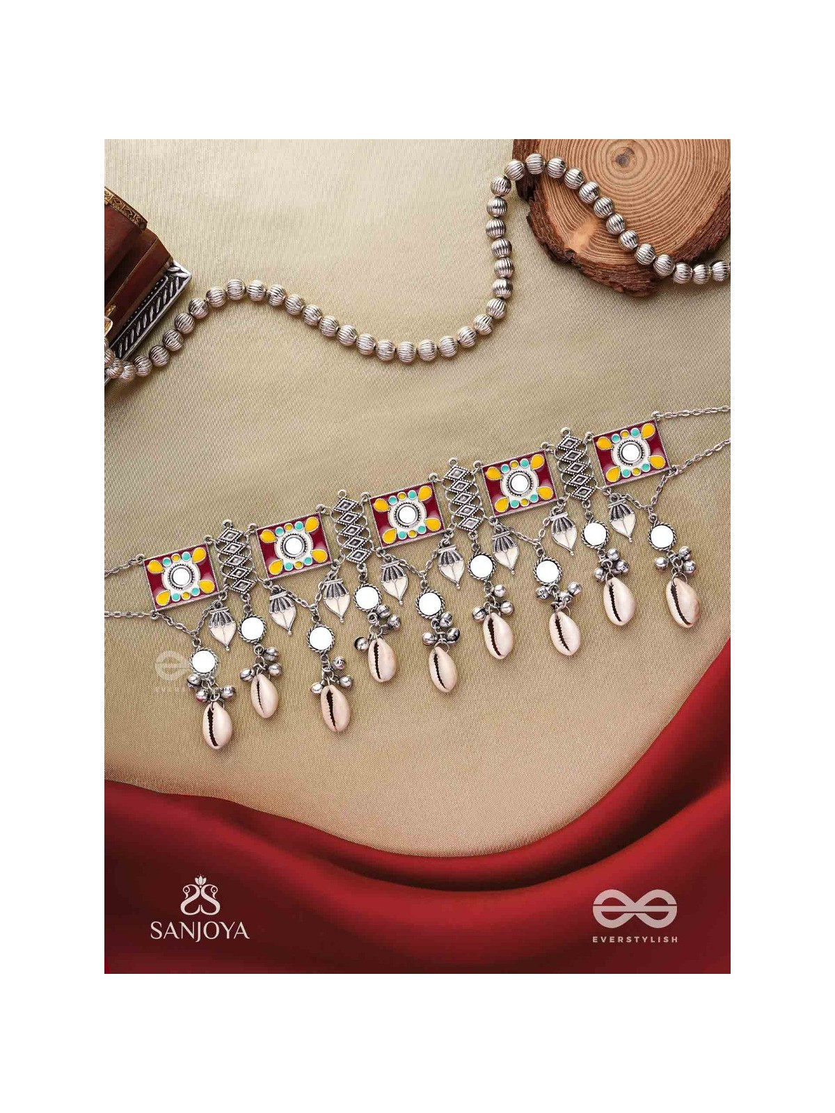  SANGRAHITAVARNA- COLLECTED HUES- ENAMELLED OXIDIZED CHOKER NECKPIECE IN PASTEL HUES WITH COWRIE SHELLS, GHUNGROOS AND MIRRORWORK
