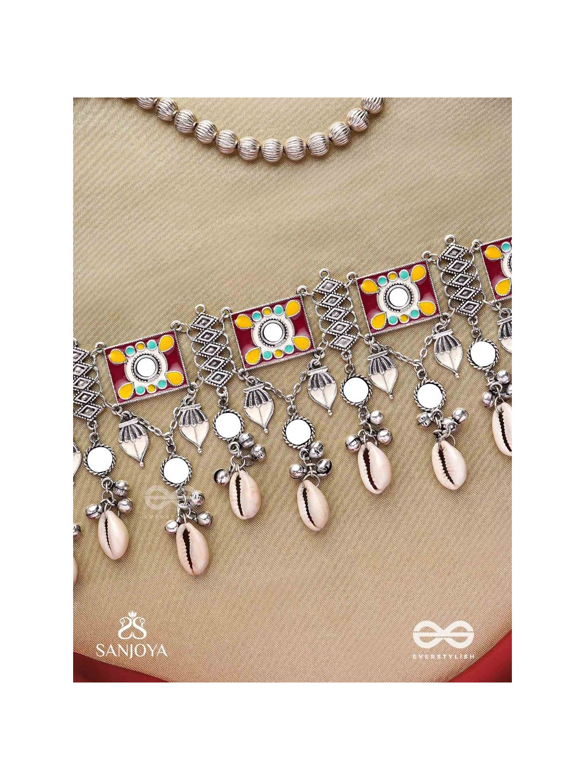  SANGRAHITAVARNA- COLLECTED HUES- ENAMELLED OXIDIZED CHOKER NECKPIECE IN PASTEL HUES WITH COWRIE SHELLS, GHUNGROOS AND MIRRORWORK