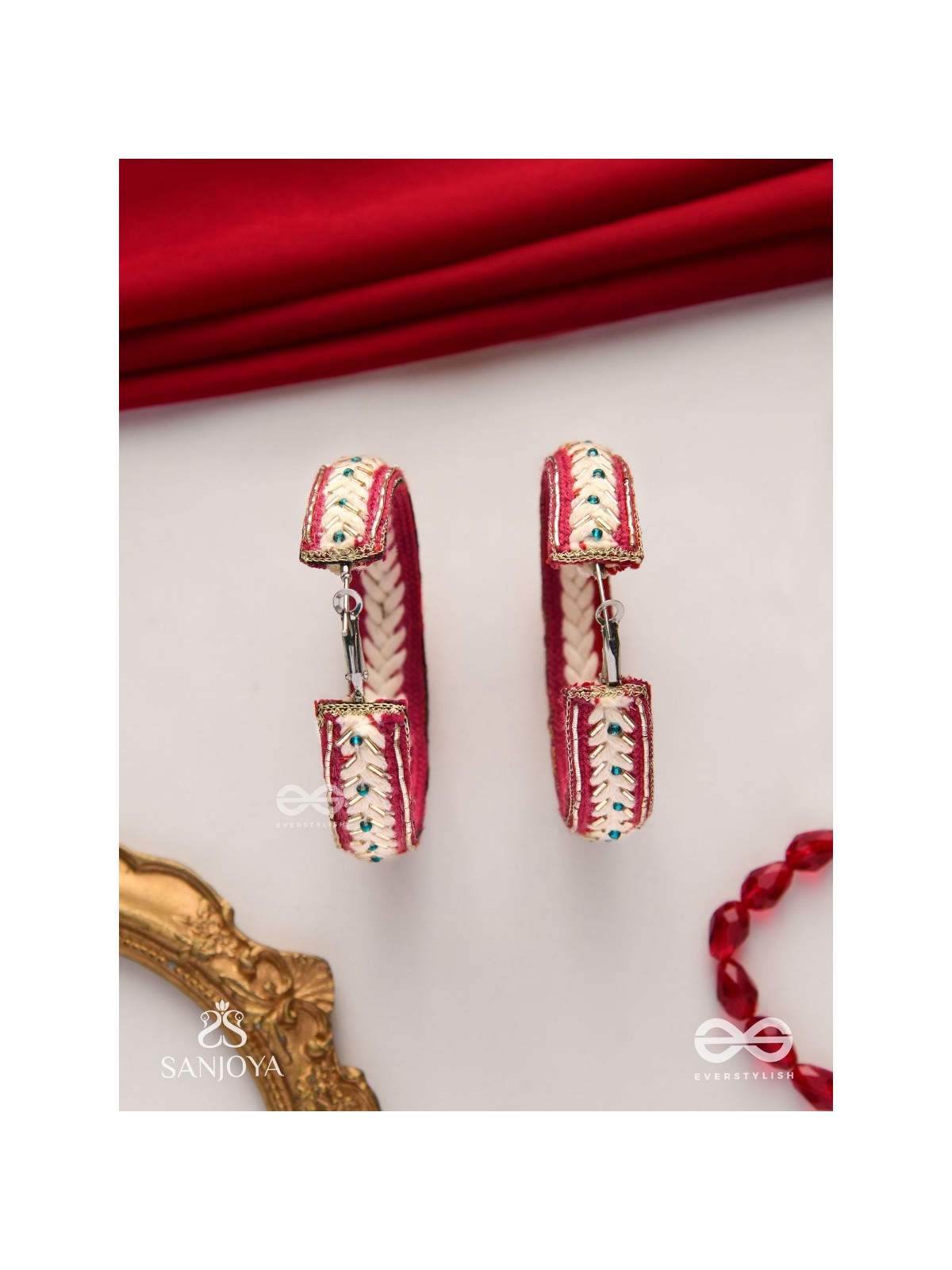 Vasantiruchi- Spring Charm- Embroidered earrings with red and white threads, decorated with beads and gold accents