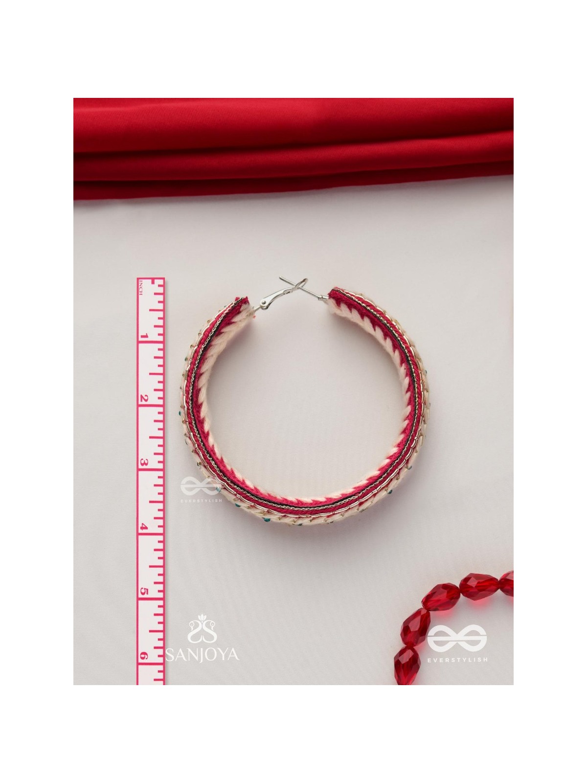 Vasantiruchi- Spring Charm- Embroidered earrings with red and white threads, decorated with beads and gold accents