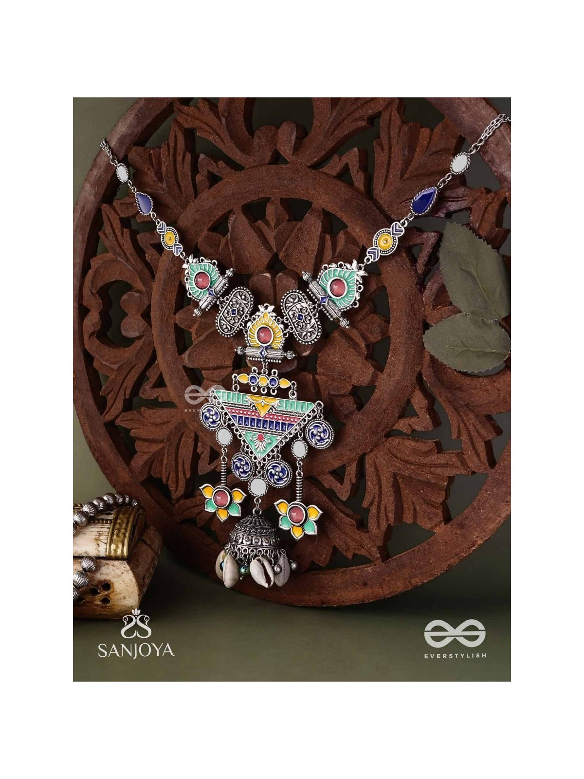Rangapadma-Color bloom- Enamelled Neckpiece with cowrie shells,mirror and colorful gemstones on oxidized metalwork.