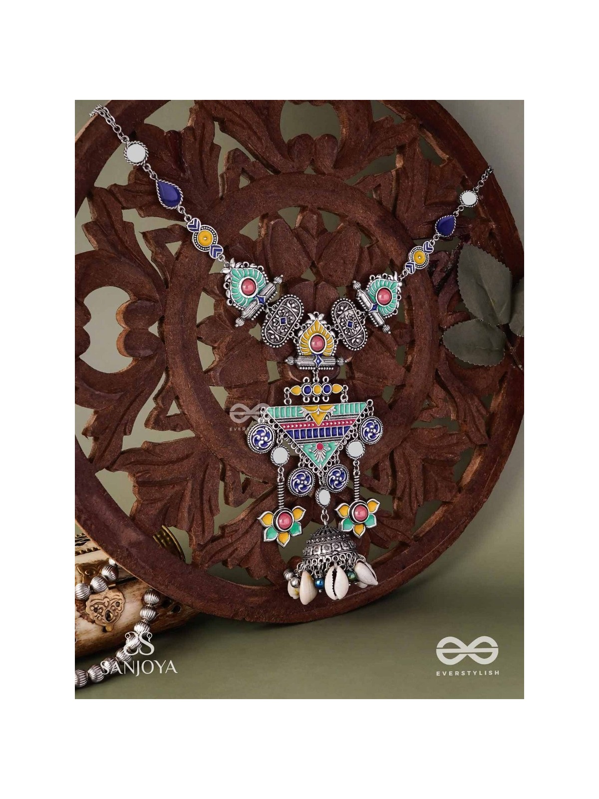 Rangapadma-Color bloom- Enamelled Neckpiece with cowrie shells,mirror and colorful gemstones on oxidized metalwork.