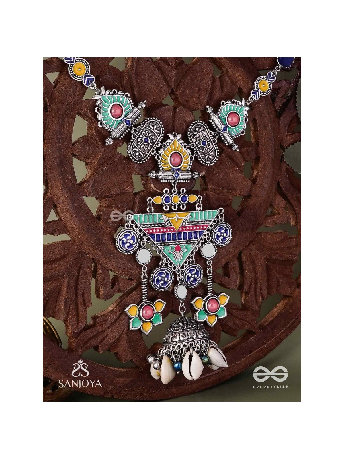 Rangapadma-Color bloom- Enamelled Neckpiece with cowrie shells,mirror and colorful gemstones on oxidized metalwork.