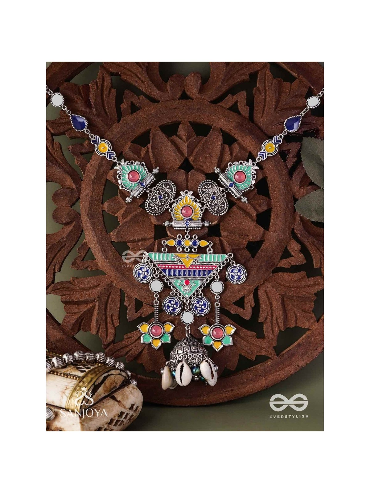 Rangapadma-Color bloom- Enamelled Neckpiece with cowrie shells,mirror and colorful gemstones on oxidized metalwork.