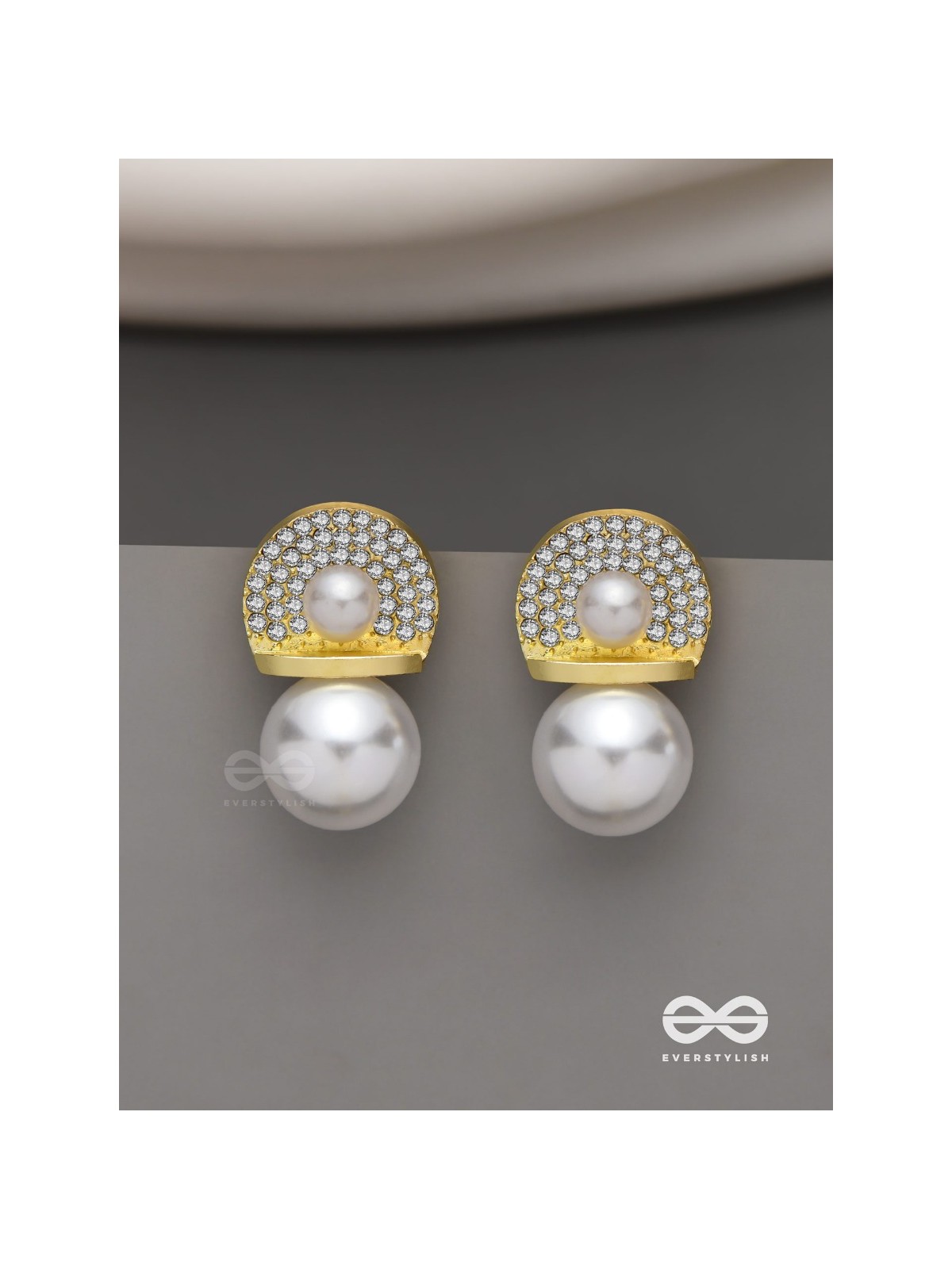 Crystal orbits-  crystal studded statement earrings with dropping pearls 