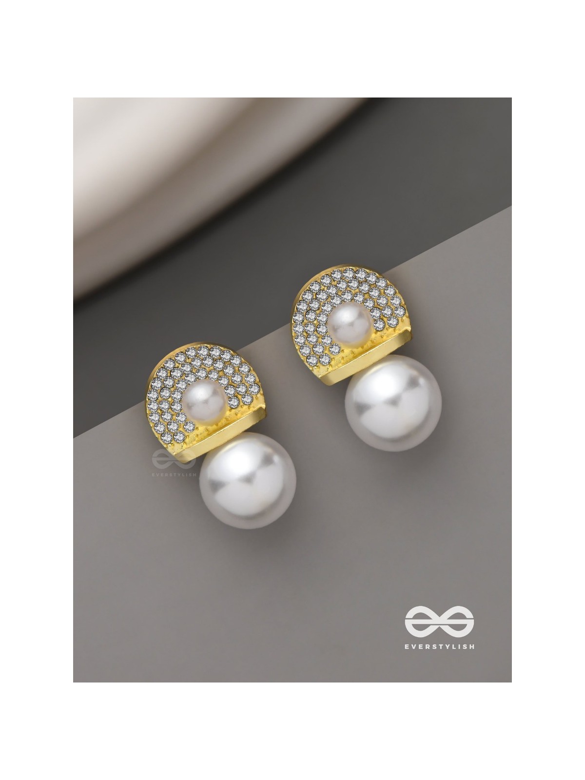 Crystal orbits-  crystal studded statement earrings with dropping pearls 