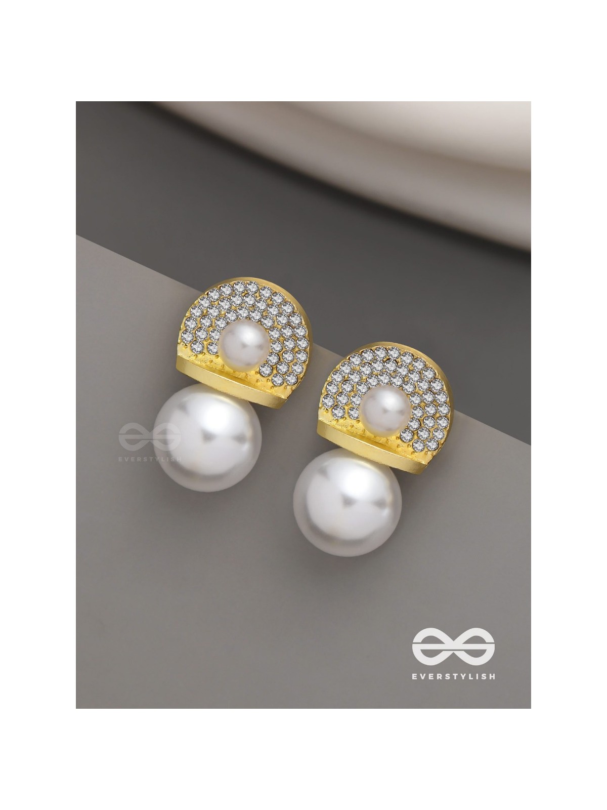 Crystal orbits-  crystal studded statement earrings with dropping pearls 
