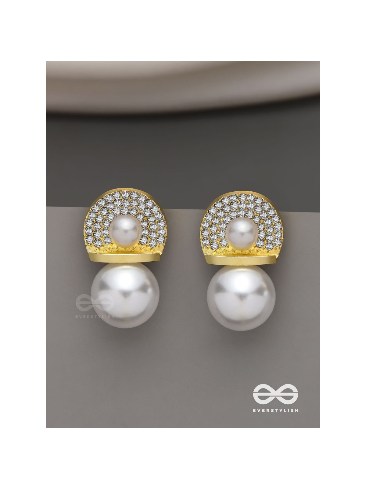 Crystal orbits-  crystal studded statement earrings with dropping pearls 