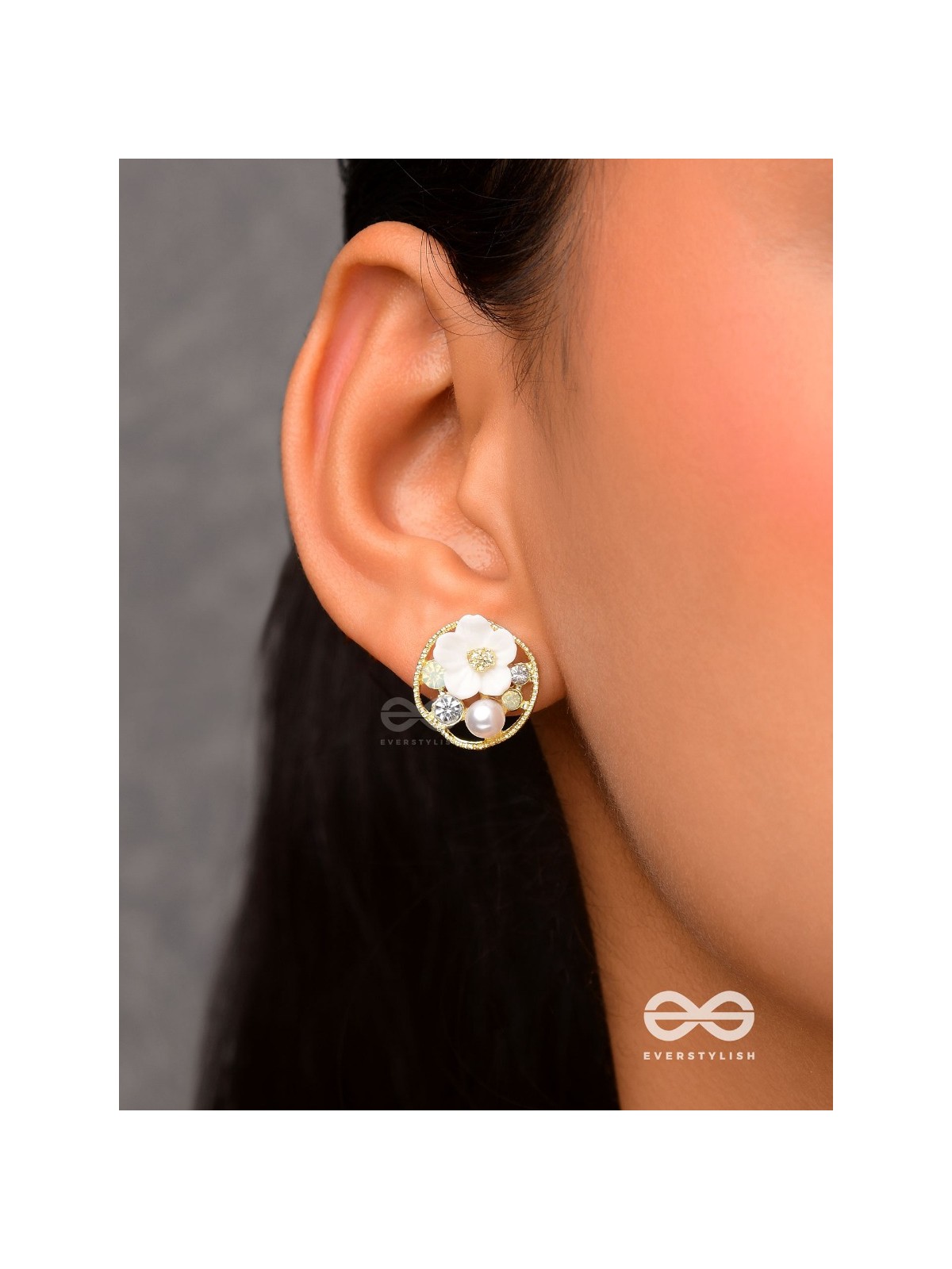 Divine temptation- white floral studs encircled with golden mesh 