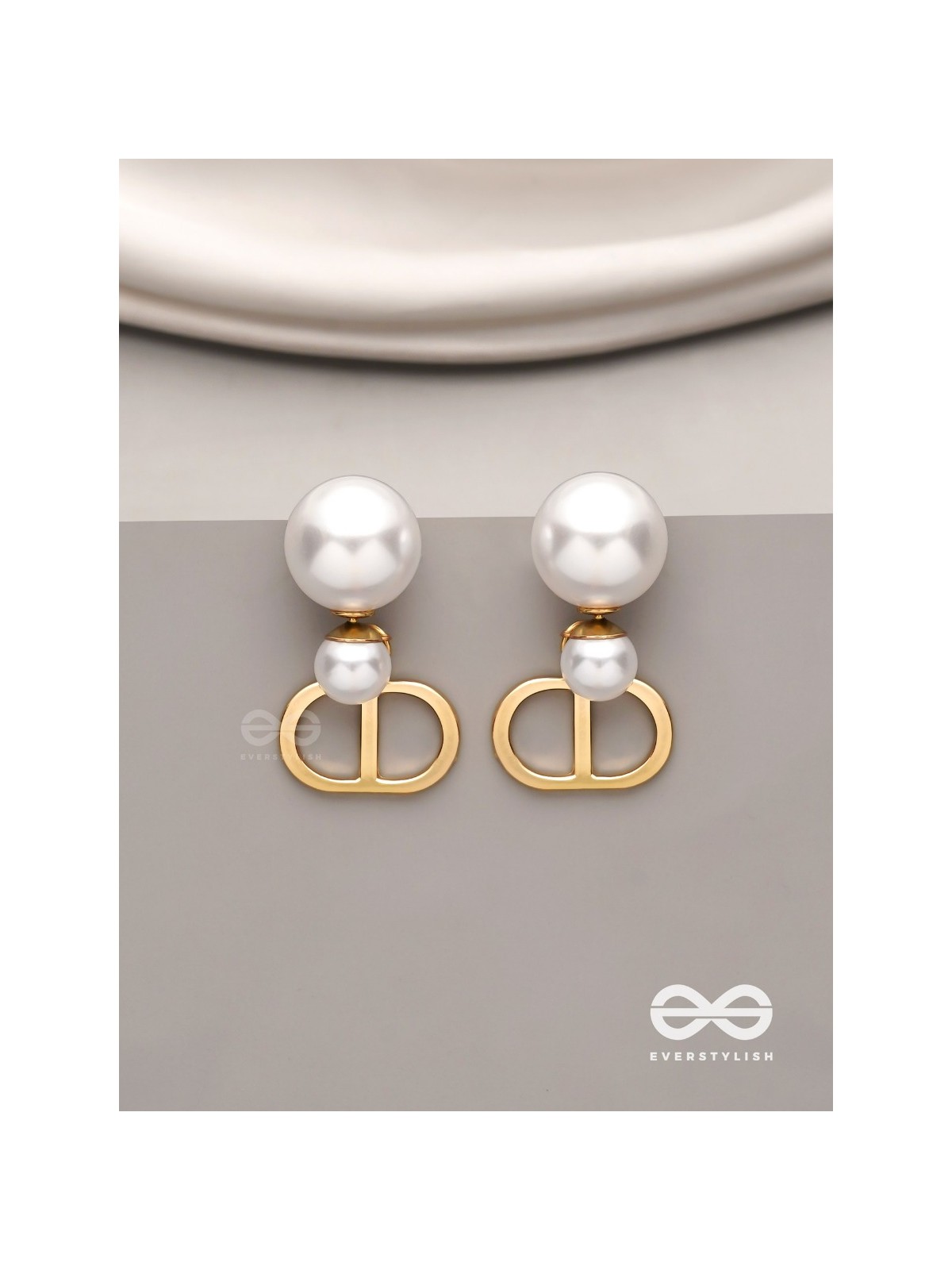 Starlit orb- dangling pearl earrings with golden spheres 