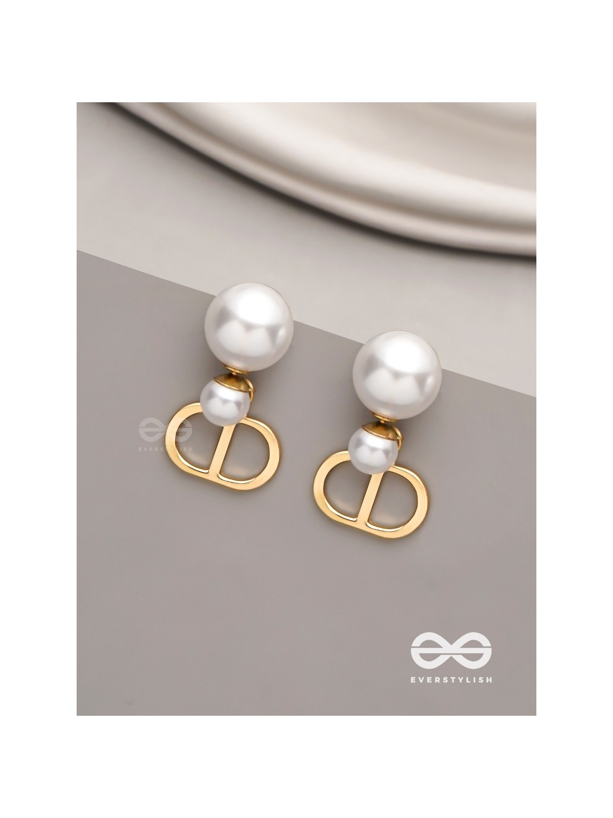 Starlit orb- dangling pearl earrings with golden spheres 