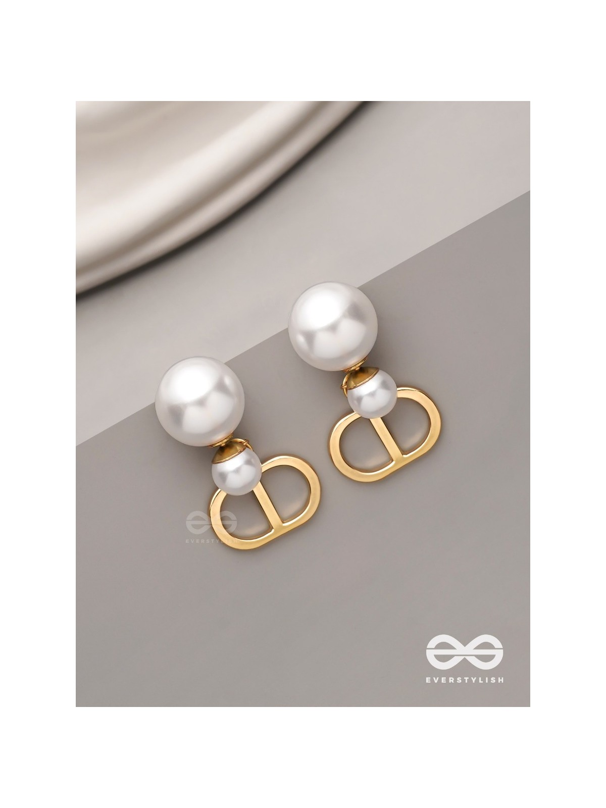 Starlit orb- dangling pearl earrings with golden spheres 