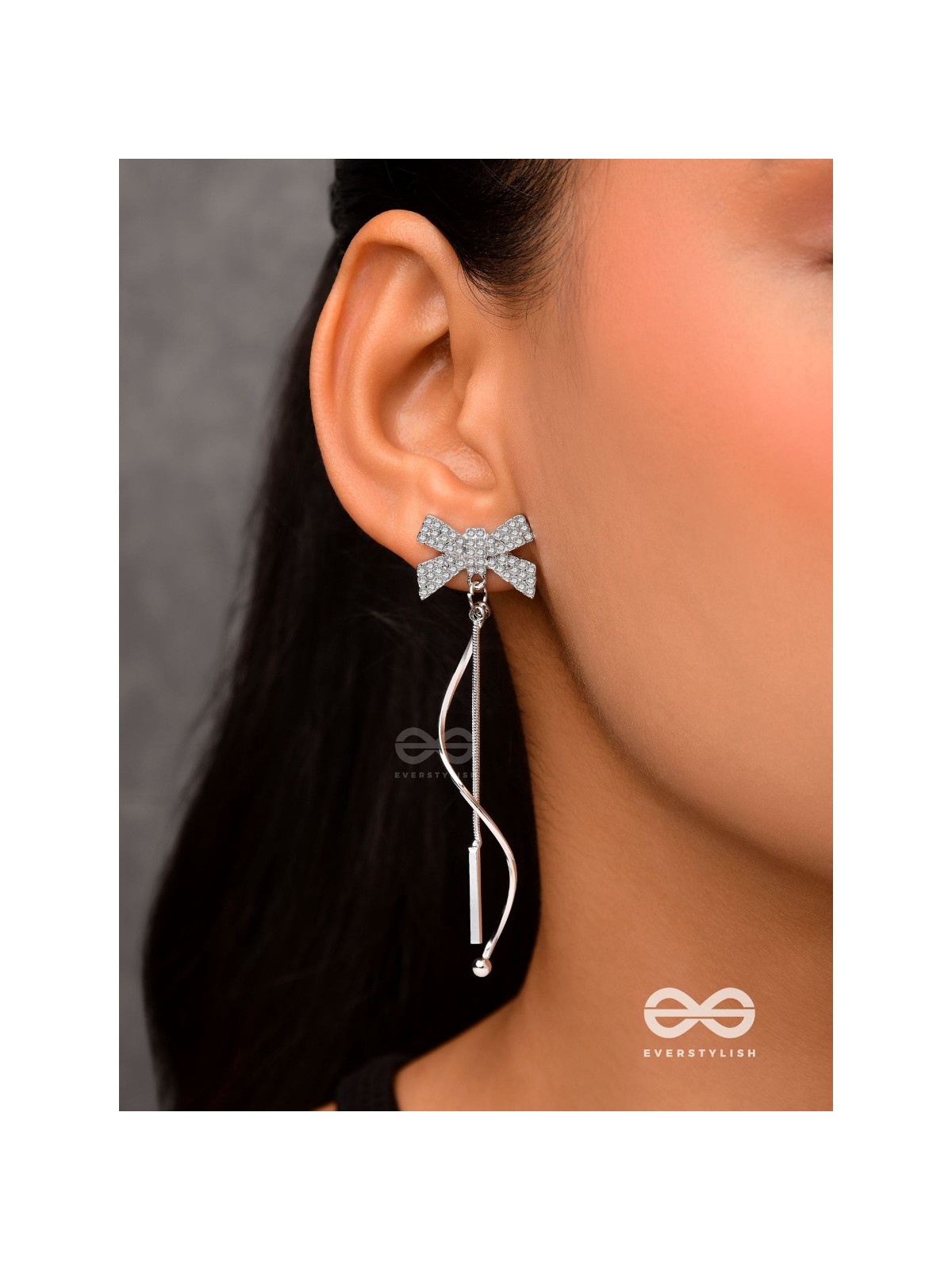 Starry Knots- Dangling Silver Cubic Zirconia Earrings 