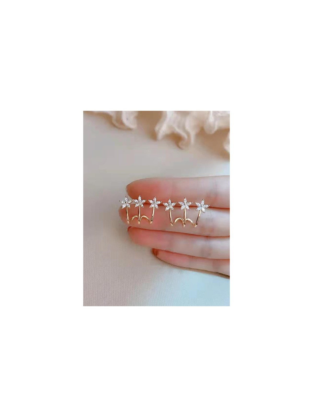 Queen’s delight - Crown shaped golden crystal studs 