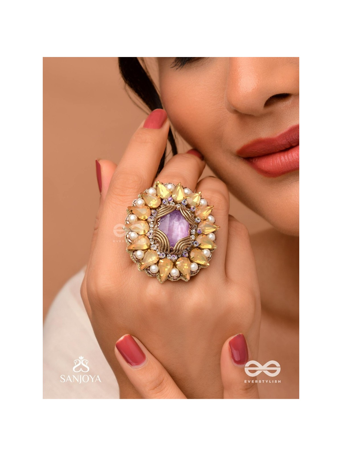 KANAKA PUSHPA – GOLDEN FLOWER EMBROIDERED FLOWER-SHAPED RING ADORNED WITH YELLOW GEMS AND PEARLS, GIVING A GOLDEN GLOW