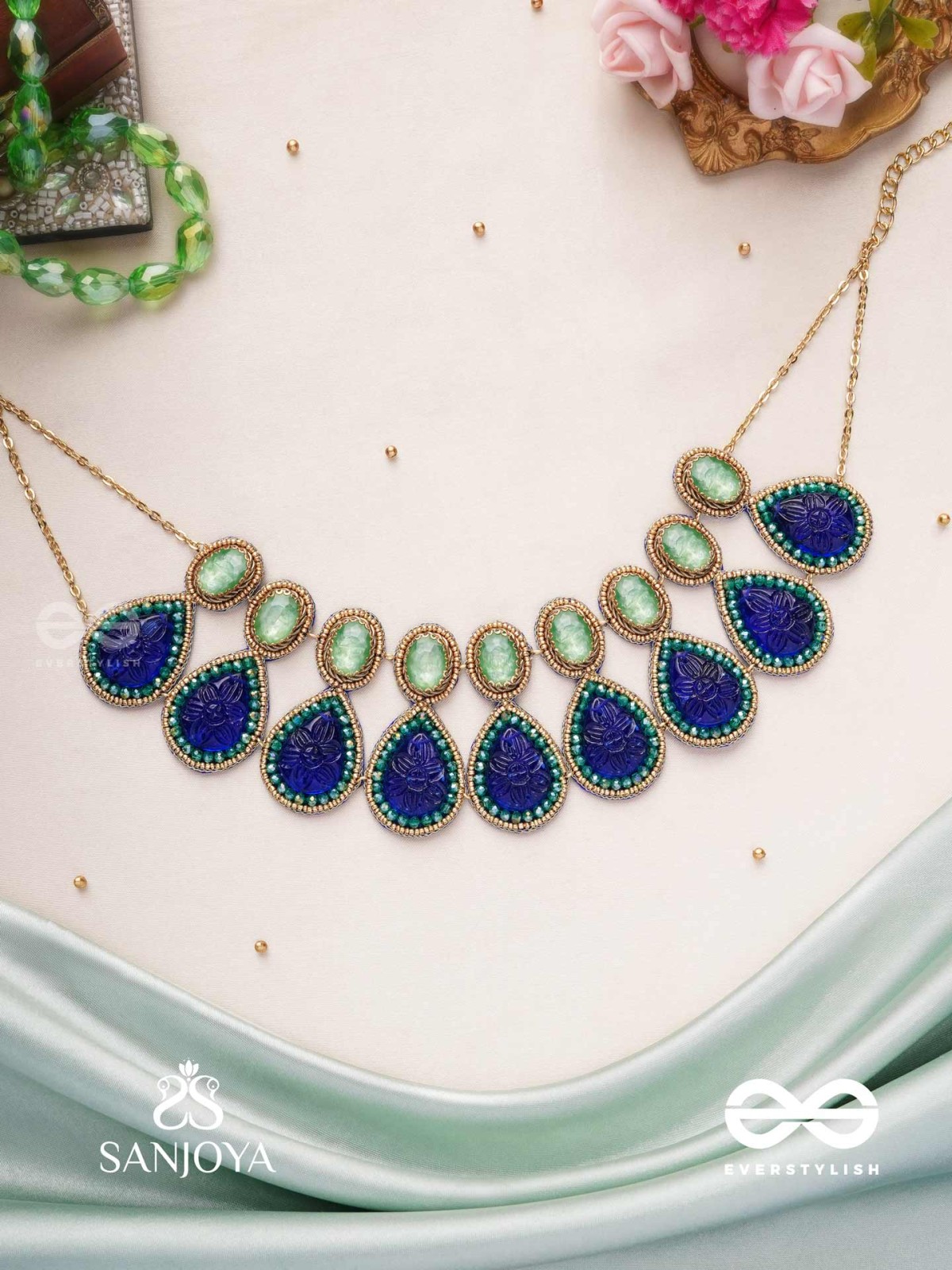 JALANEELINI - WATER LIKE BLUE ELEGANCE - BLUE TEARDROP SHAPES, GEMSTONES WITH GOLDEN EBELLISHED NECKLACE