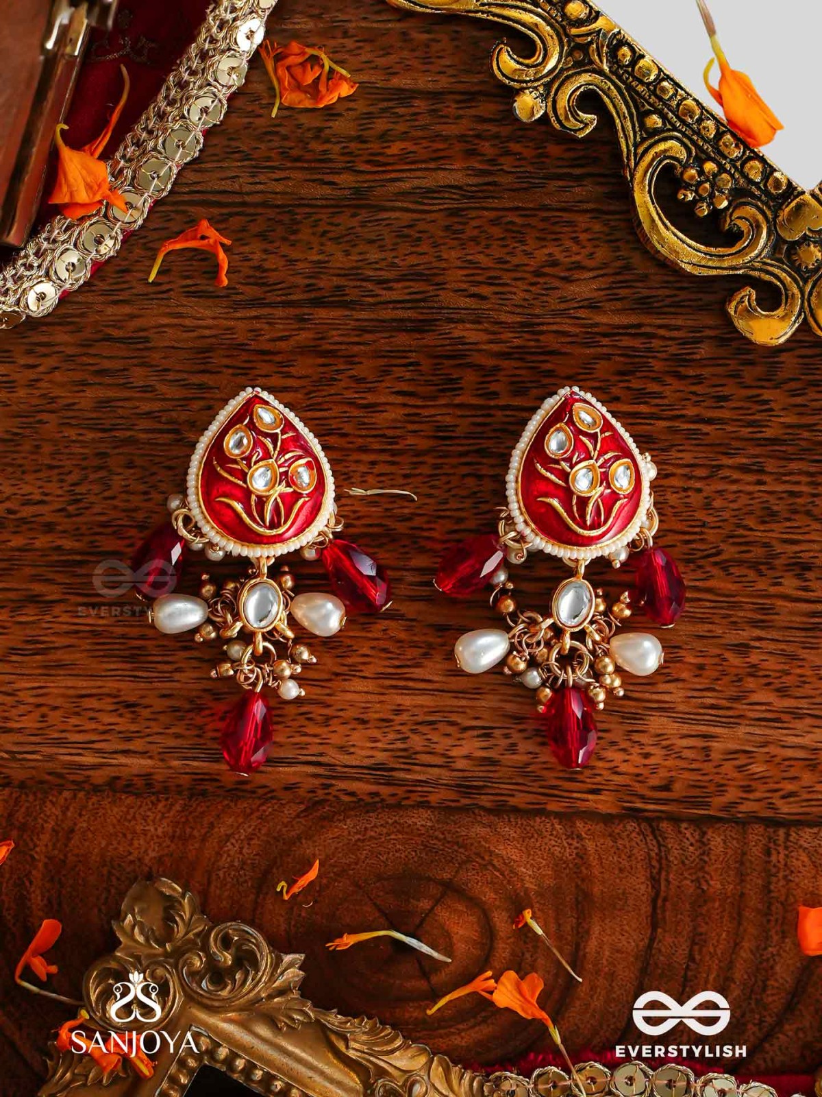 ARUNAMUKHI- FACE OF THE RED SUN- GLORIOUS KUNDAN EARRINGS WITH RED ENAMEL DETAILS AND PEARL EMBELLISHMENTS 