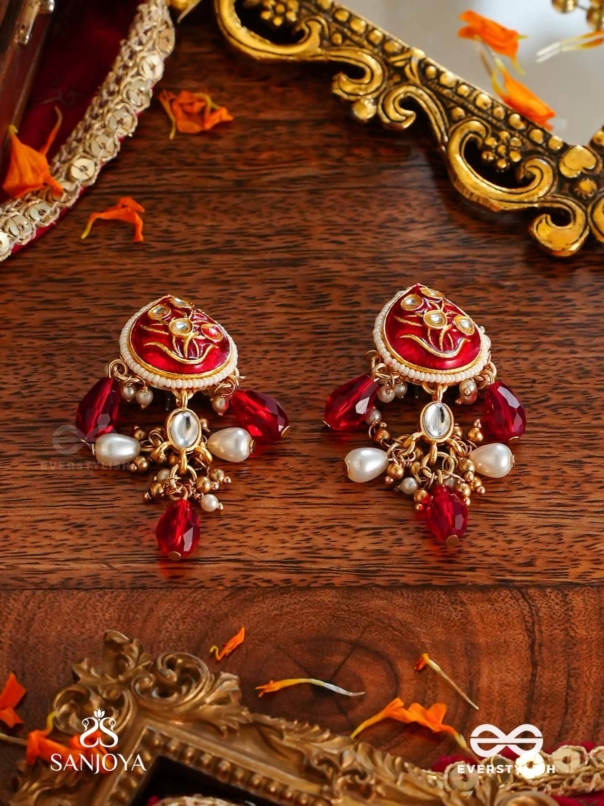 ARUNAMUKHI- FACE OF THE RED SUN- GLORIOUS KUNDAN EARRINGS WITH RED ENAMEL DETAILS AND PEARL EMBELLISHMENTS 