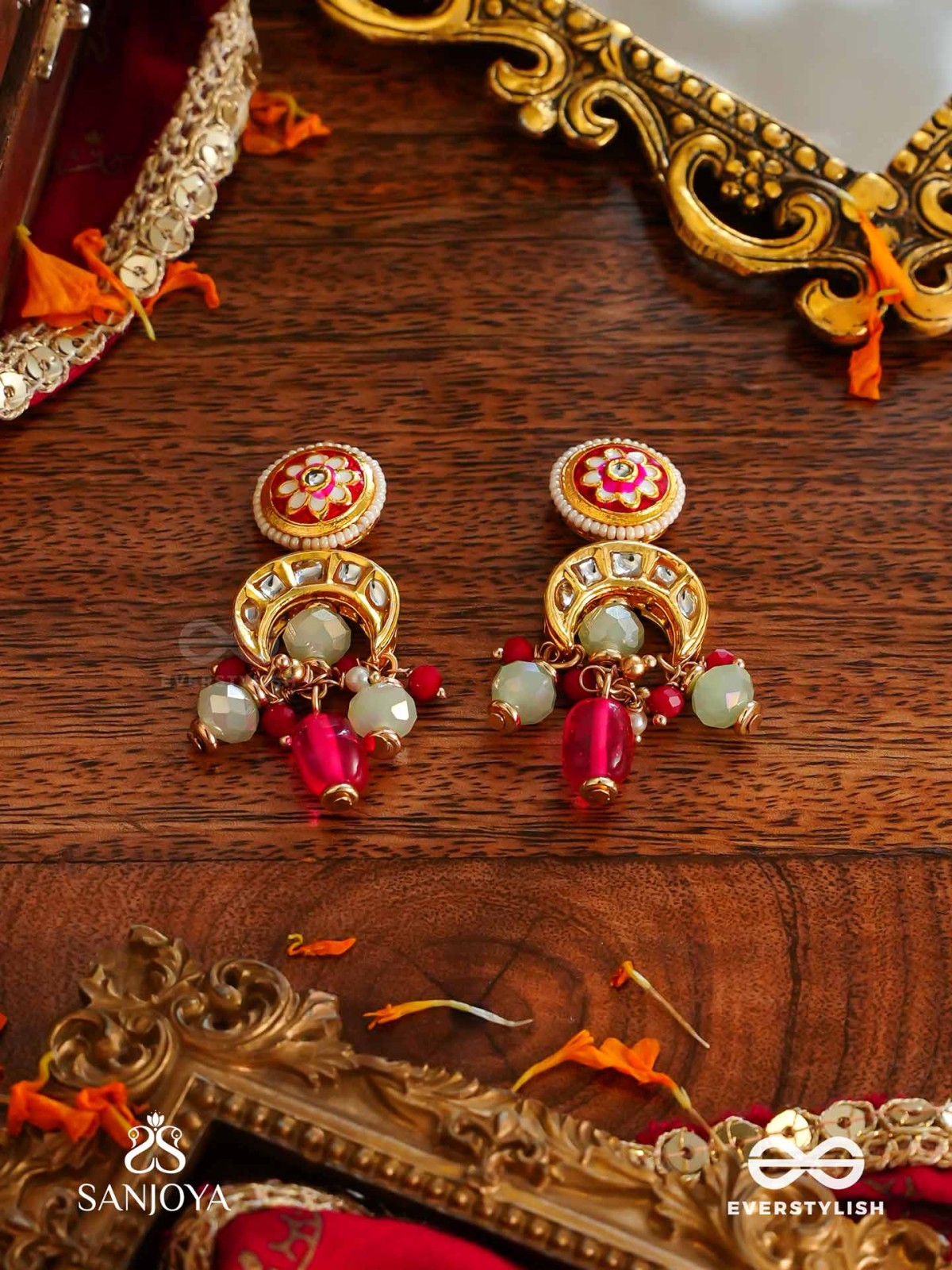 SHONAPRABHA- RADIANCE OF GOLD AND RED- HANDCRAFTED KUNDAN EARRINGS  WITH GOLDEN MOONS AND RED BEADS