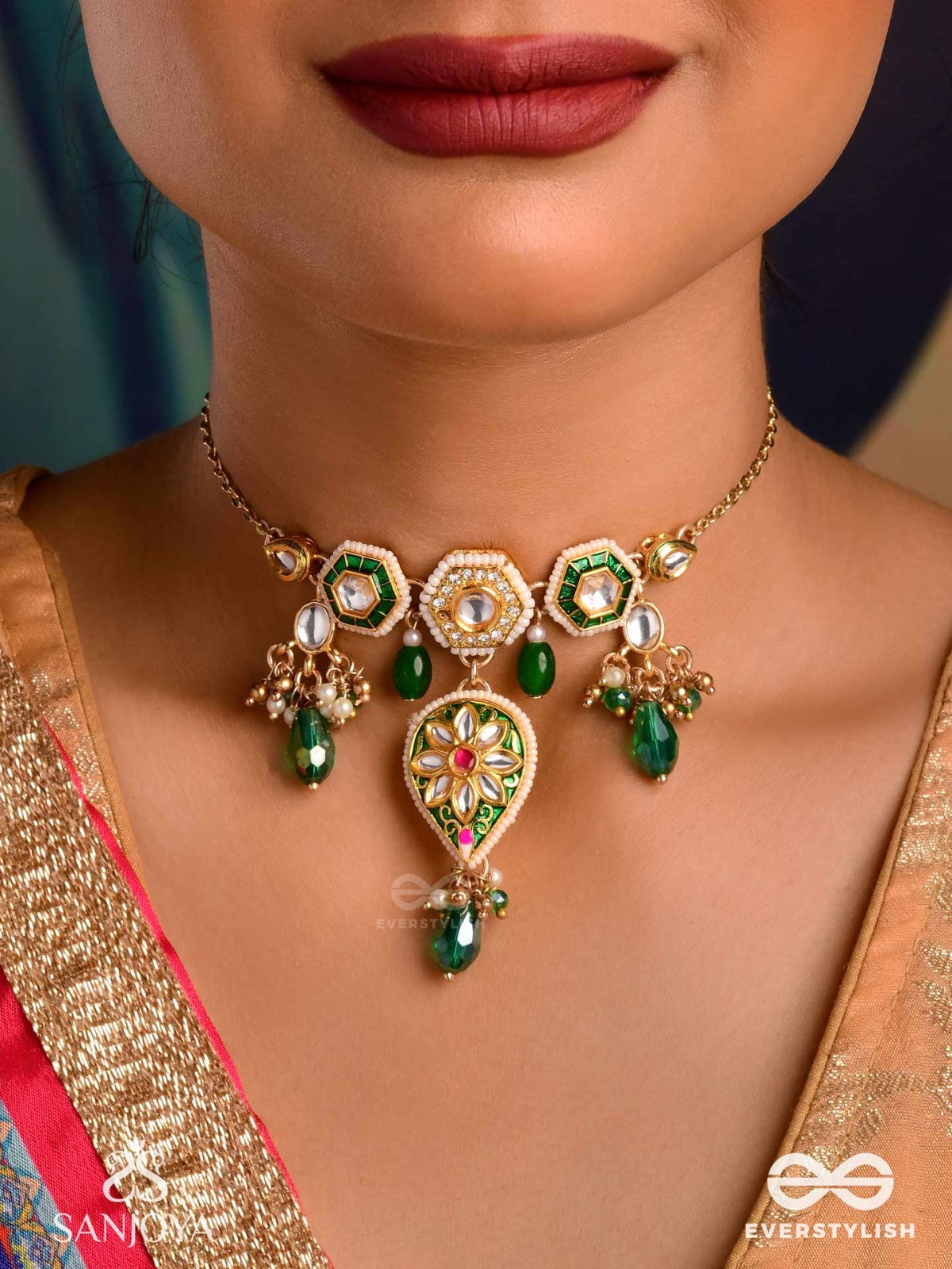 JALNIDHI - OCEAN’S TREASURE - HANDCRAFTED KUNDAN NECKLACE WITH GREEN GEMSTONES AND GOLDEN DETAILS