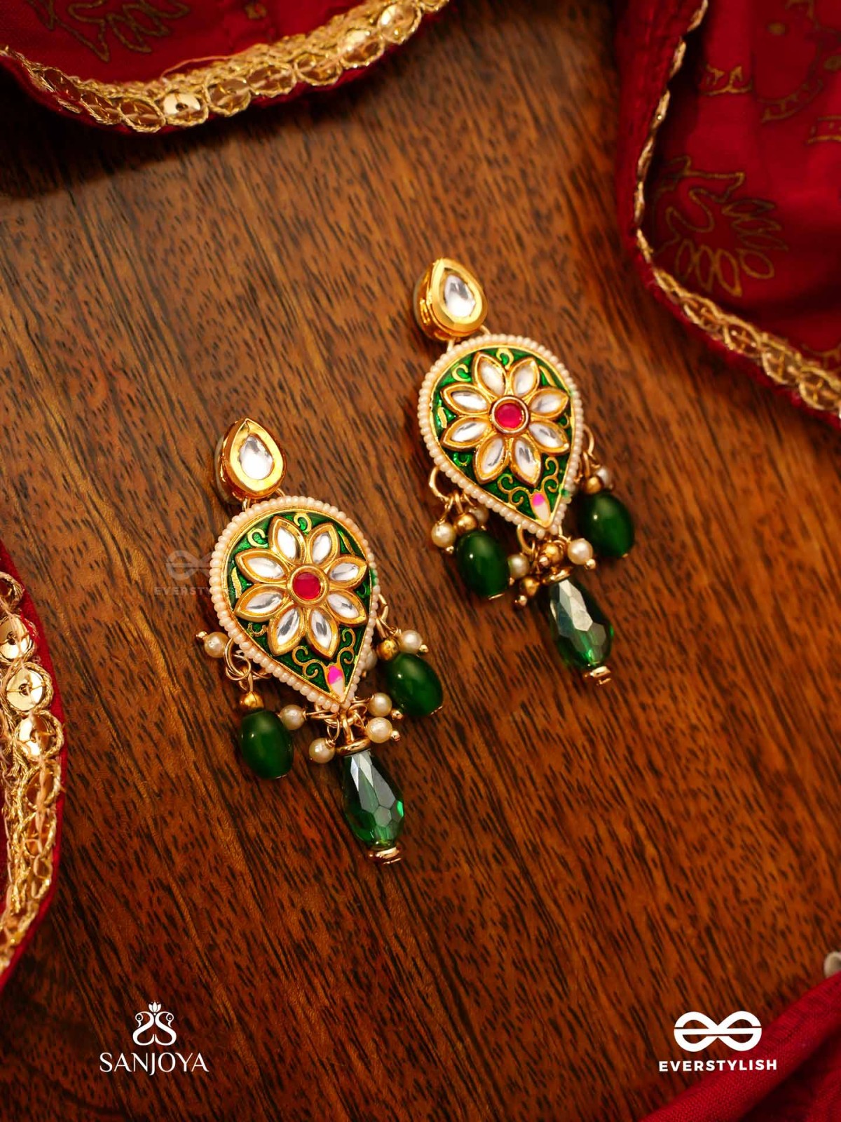 JALNIDHI - OCEAN’S TREASURE - HANDCRAFTED KUNDAN EARRINGS WITH GREEN GEMSTONES AND GOLDEN DETAILS