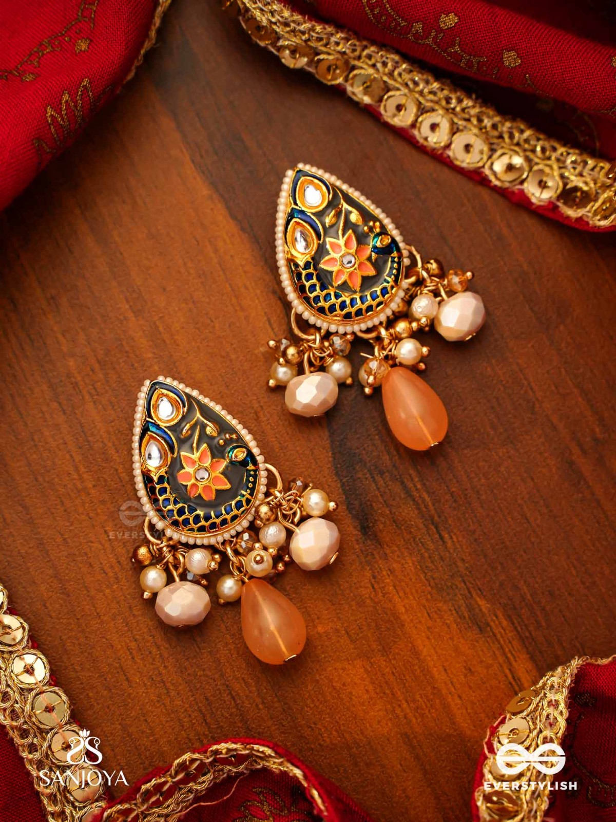 SANDHYAPRIYA - LOVER OF DUSK - EXQUISITE GOLDEN ENAMELLED KUNDAN EARRINGS WITH LUSTROUS ORANGE GEM DROPS