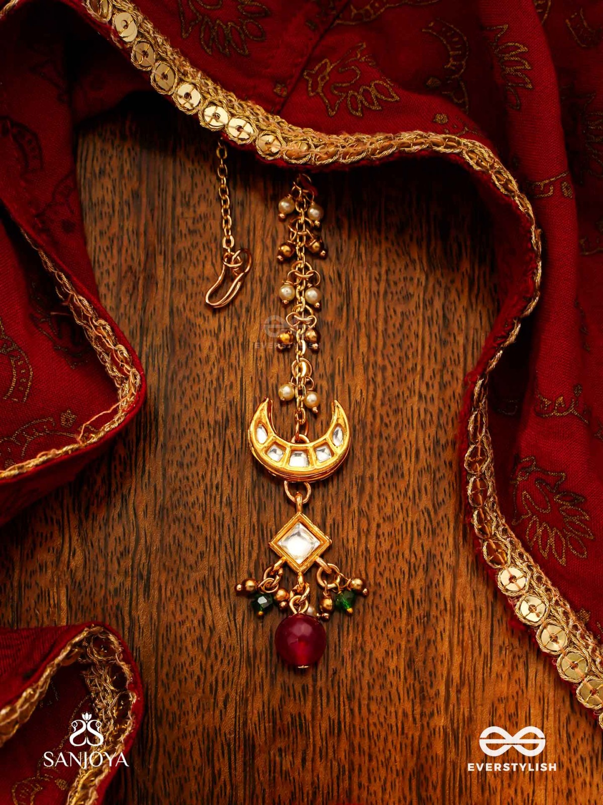 INDURAGA - MELODY OF THE MOON - ROYAL KUNDAN MAANGTIKA WITH CRESCENT MOTIFS AND RUBY DROPS