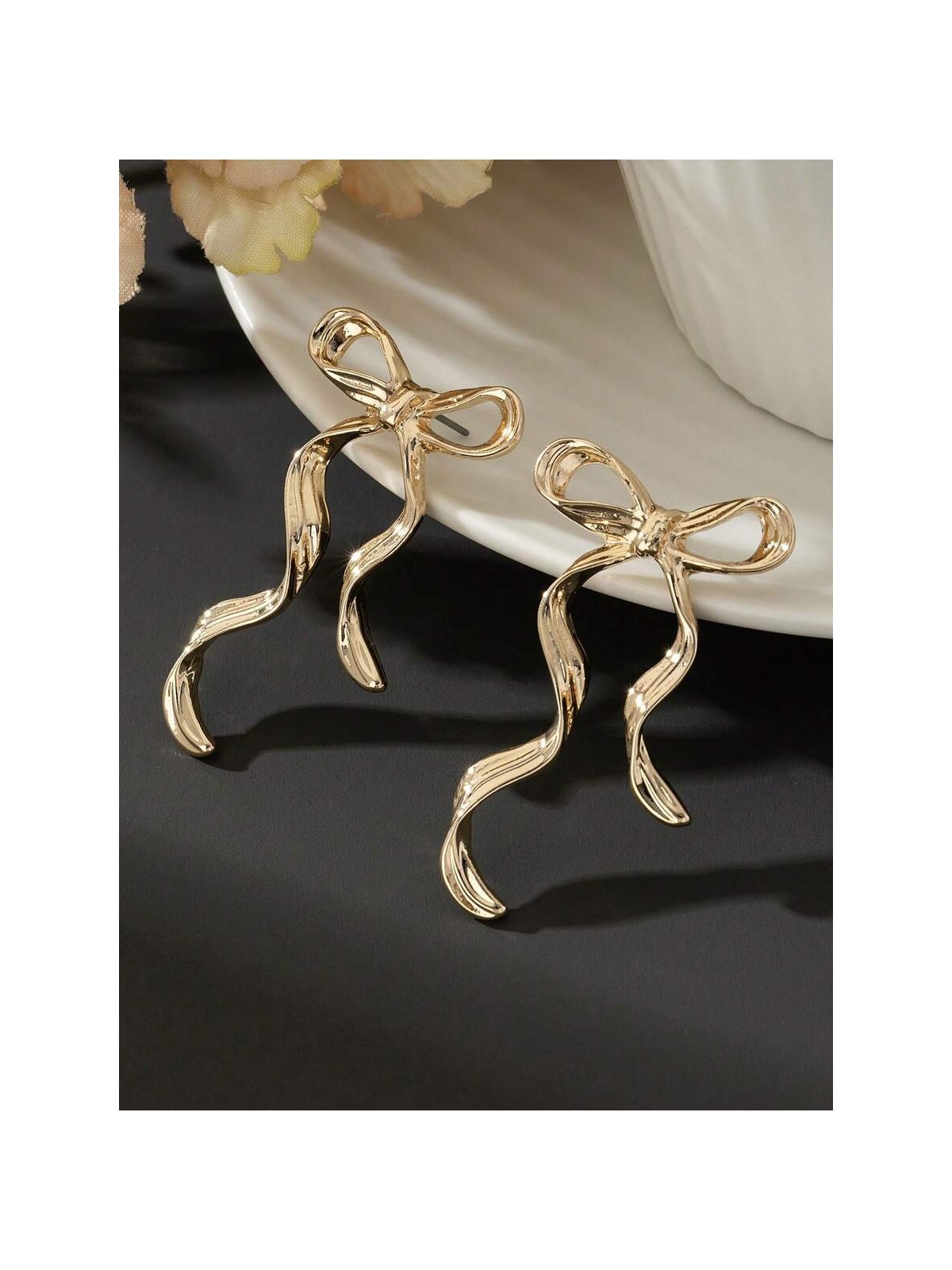 WISP KNOT- SOFT AND CURVY BOW INSPIRED EARRINGS