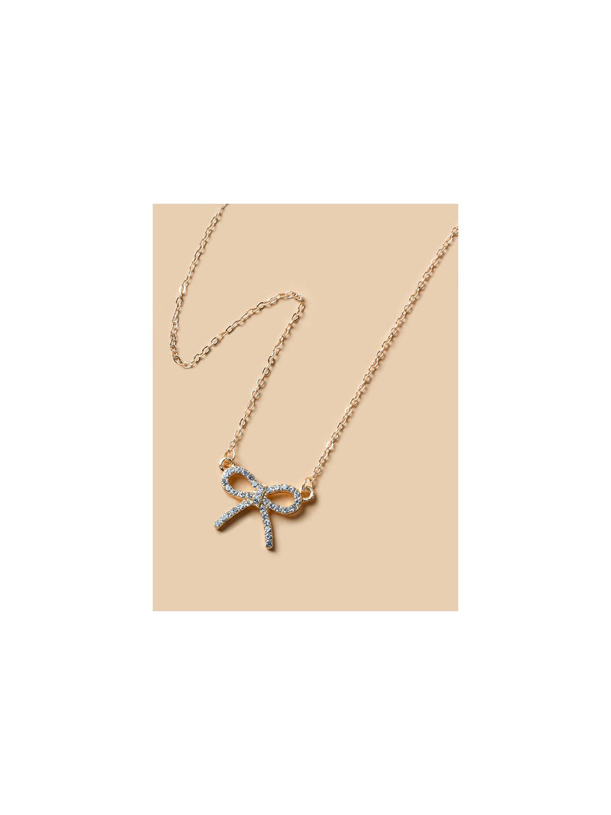 TIED IN GOLD- MINIMALIST BOW NECKPIECE