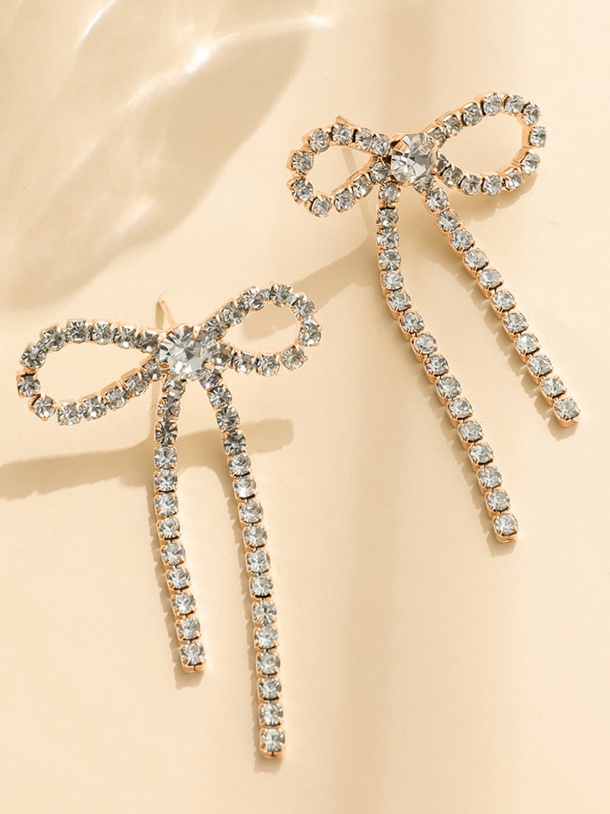 GOLDEN GLIMMER BOW -  GRACEFUL AND SPARKLING BOW EARRINGS