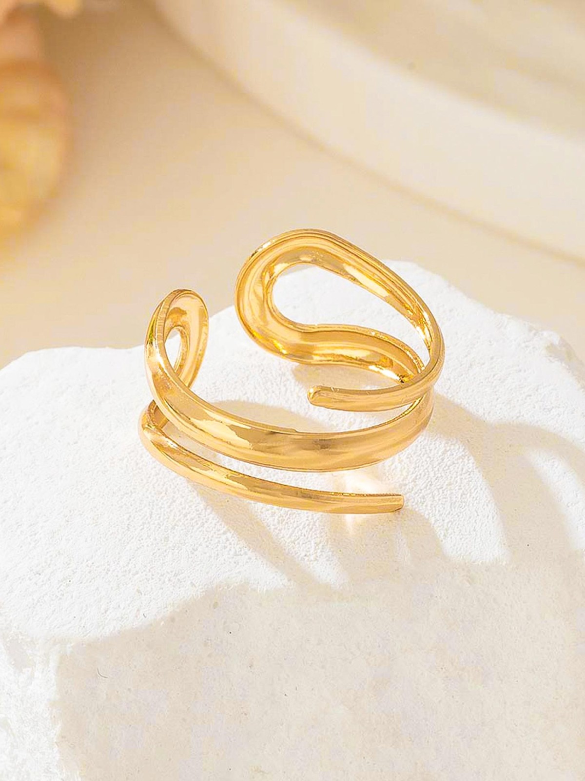 AURIC SWIRL - CONTEMPORARY GOLDEN TWIST RING+ TWISTED GLEAM- SLEEK AND POLISHED METALLIC CUFF BRACELET