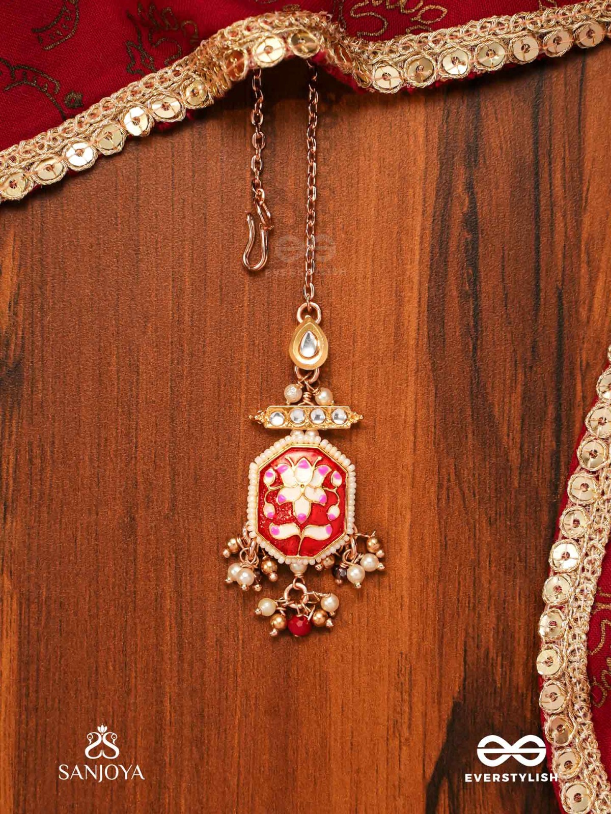ABHARANI - THE ADORNED QUEEN- FINE TRADITIONAL KUNDAN MAANGTIKA WITH RED ENAMEL WORK, PEARL AND BEADS