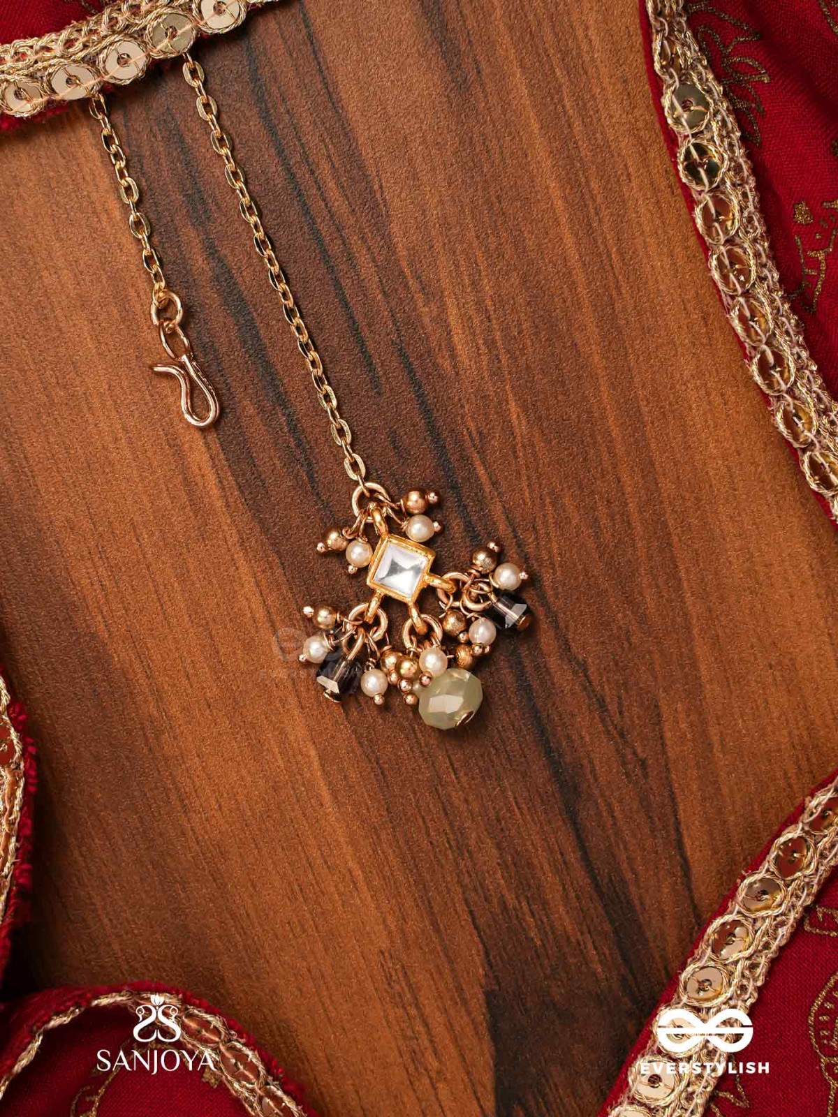 HARSHITA - THE JOYFUL ONE- DELICATE PEARL MAANGTIKA WITH MINI KUNDAN BLOOMS AND GREEN GEM DROPLETS